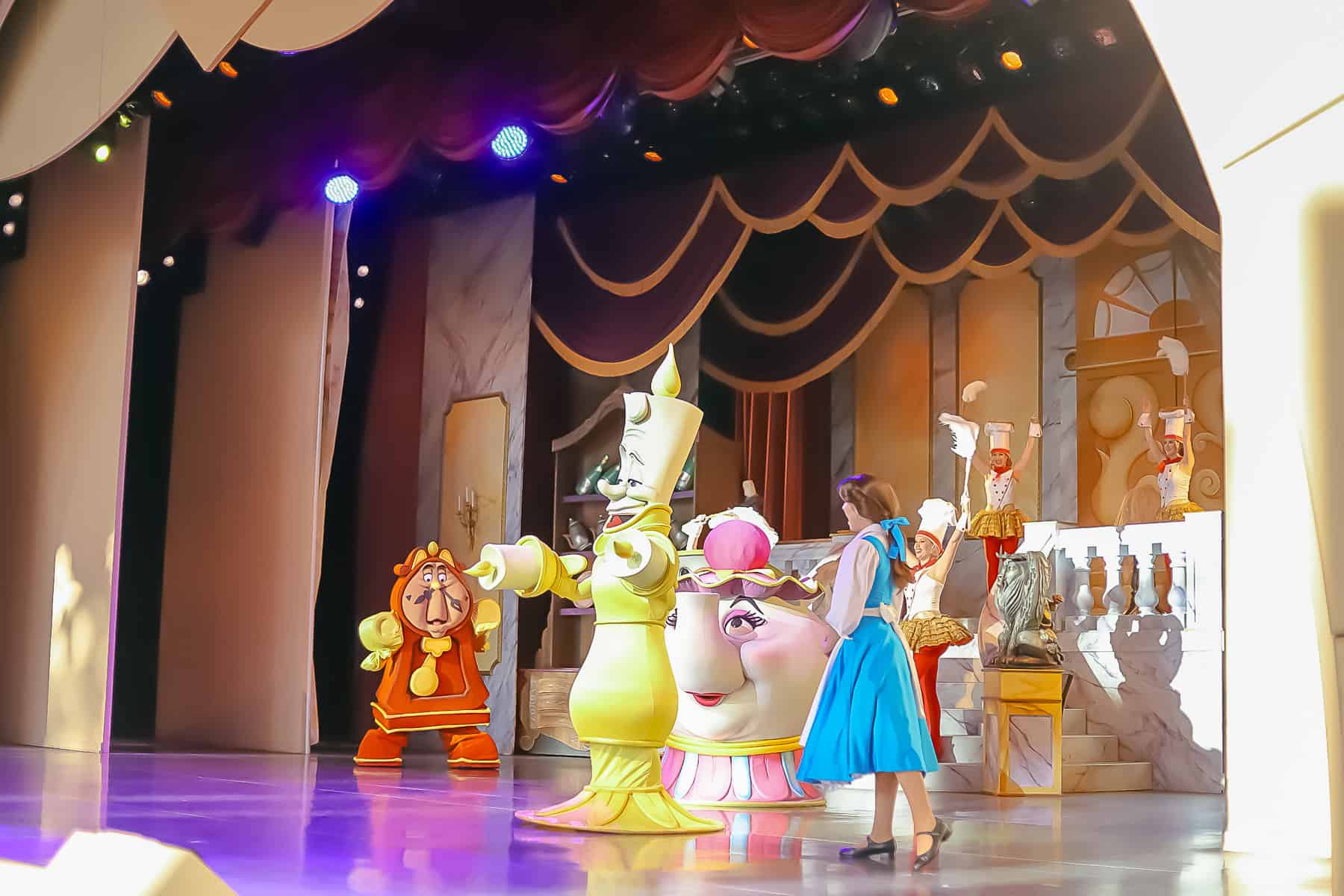Belle on stage with Lumiere 