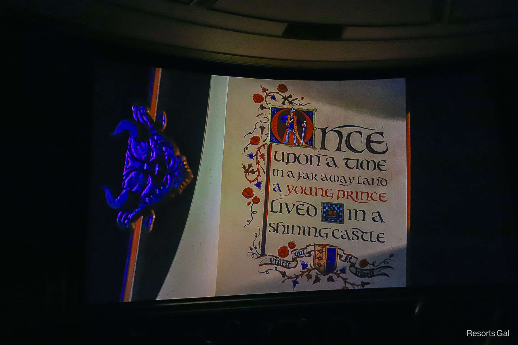 a book on the screen that begins with "Once Upon a Time" 