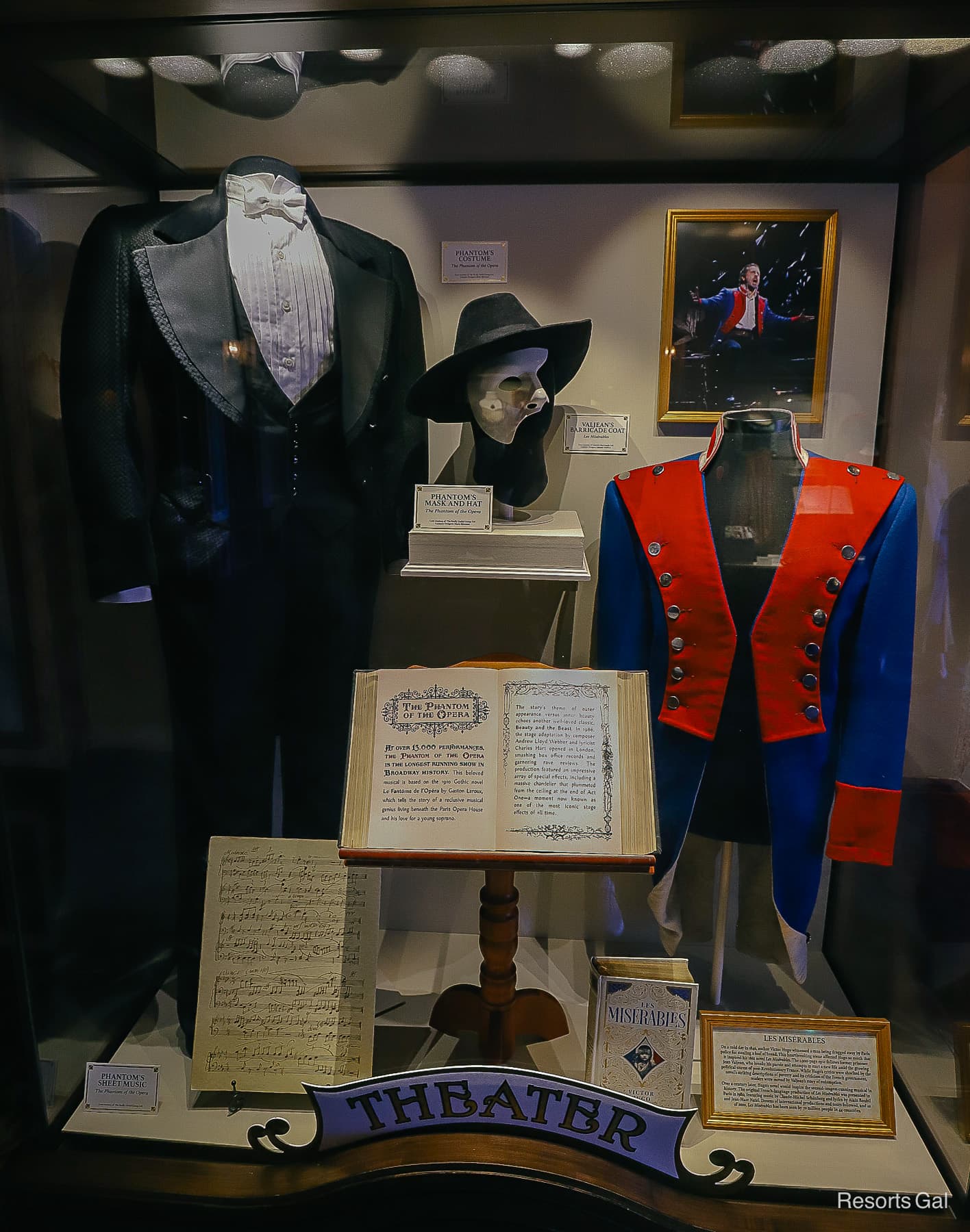 Phantom of the Opera display case with items and costumes from the play 