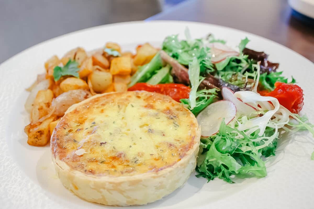 a breakfast quiche with salad at a Disney Resort Hotel