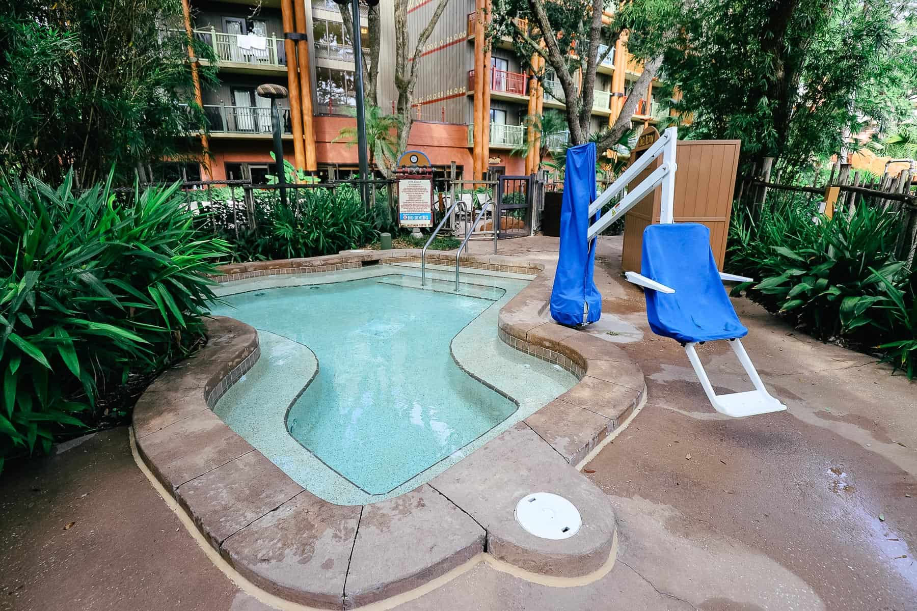 A hot tub spa surrounded by private landscape. 