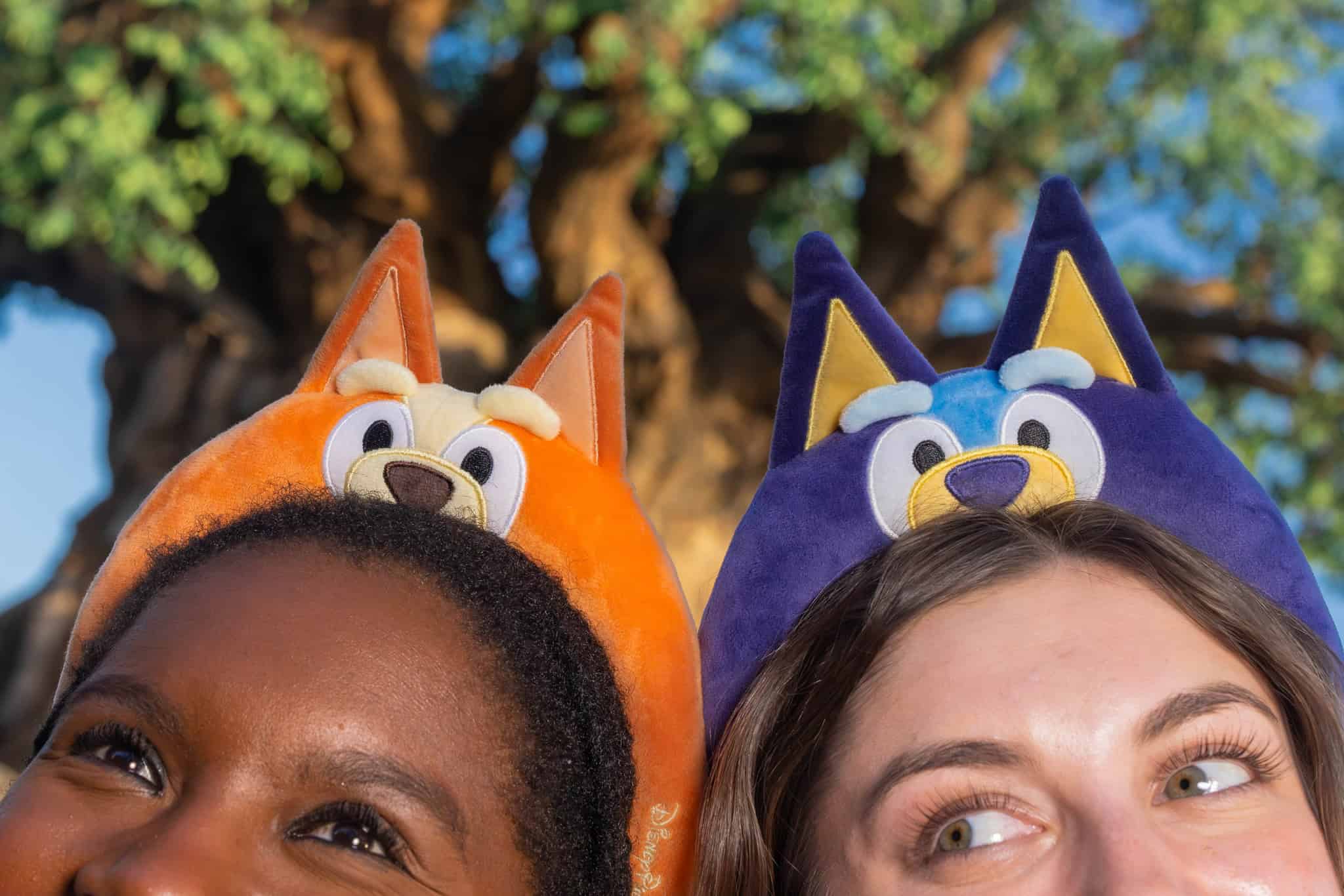 a Bluey and Bingo plush headband worn by models 