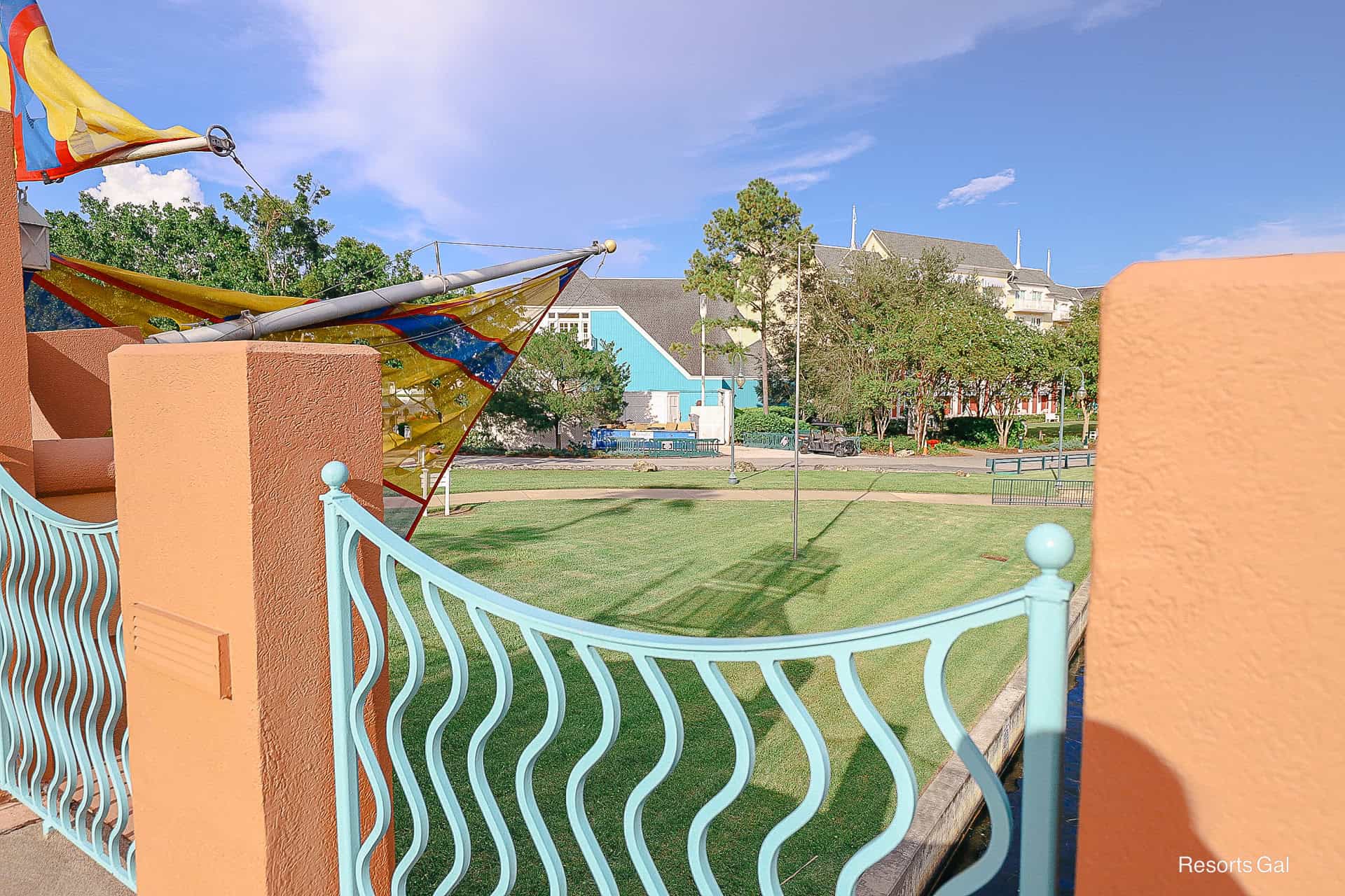 a view of new turquoise paint going up at Disney's Boardwalk