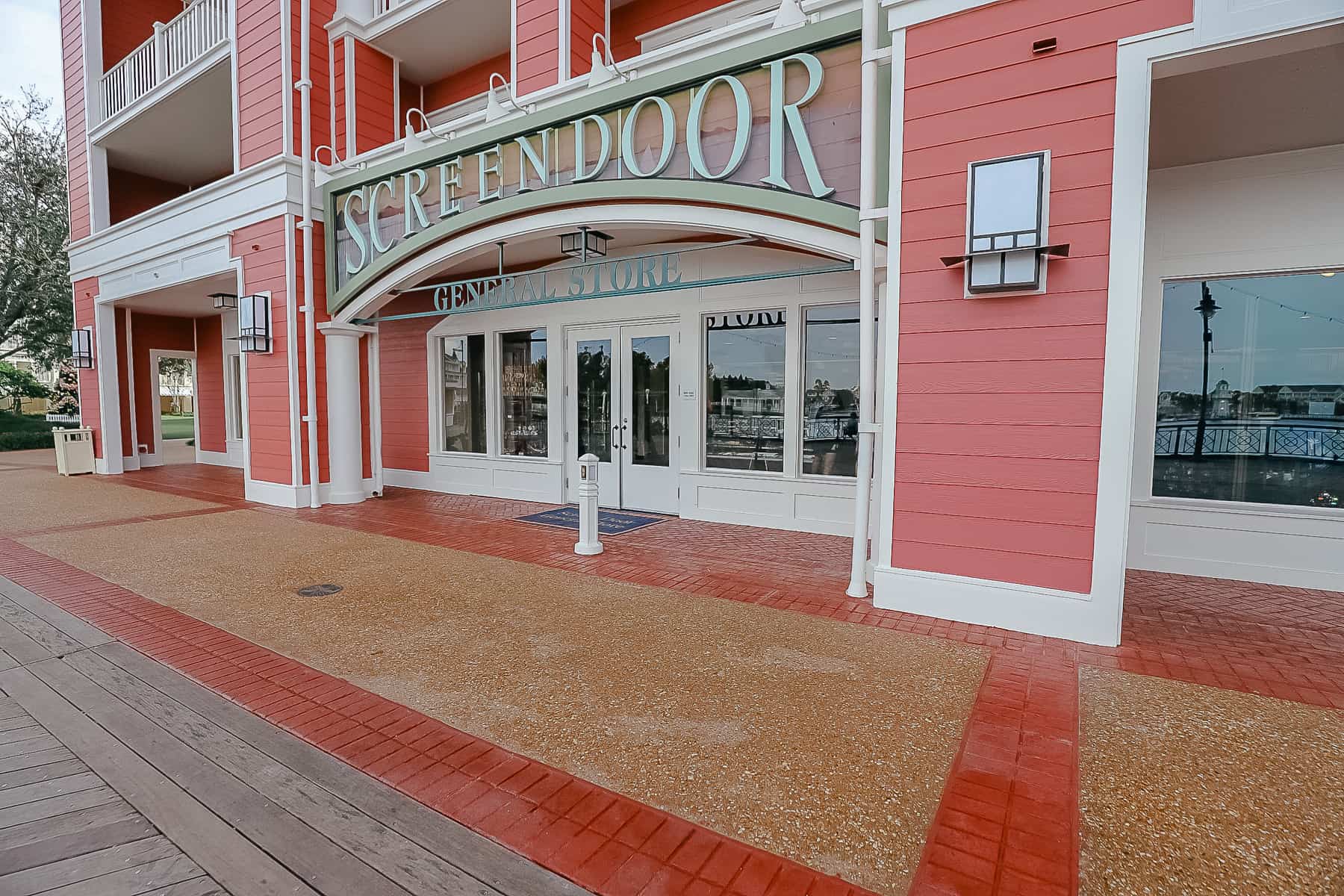 Shows the concrete work completed in front of Boardwalk's Screen Door store. 
