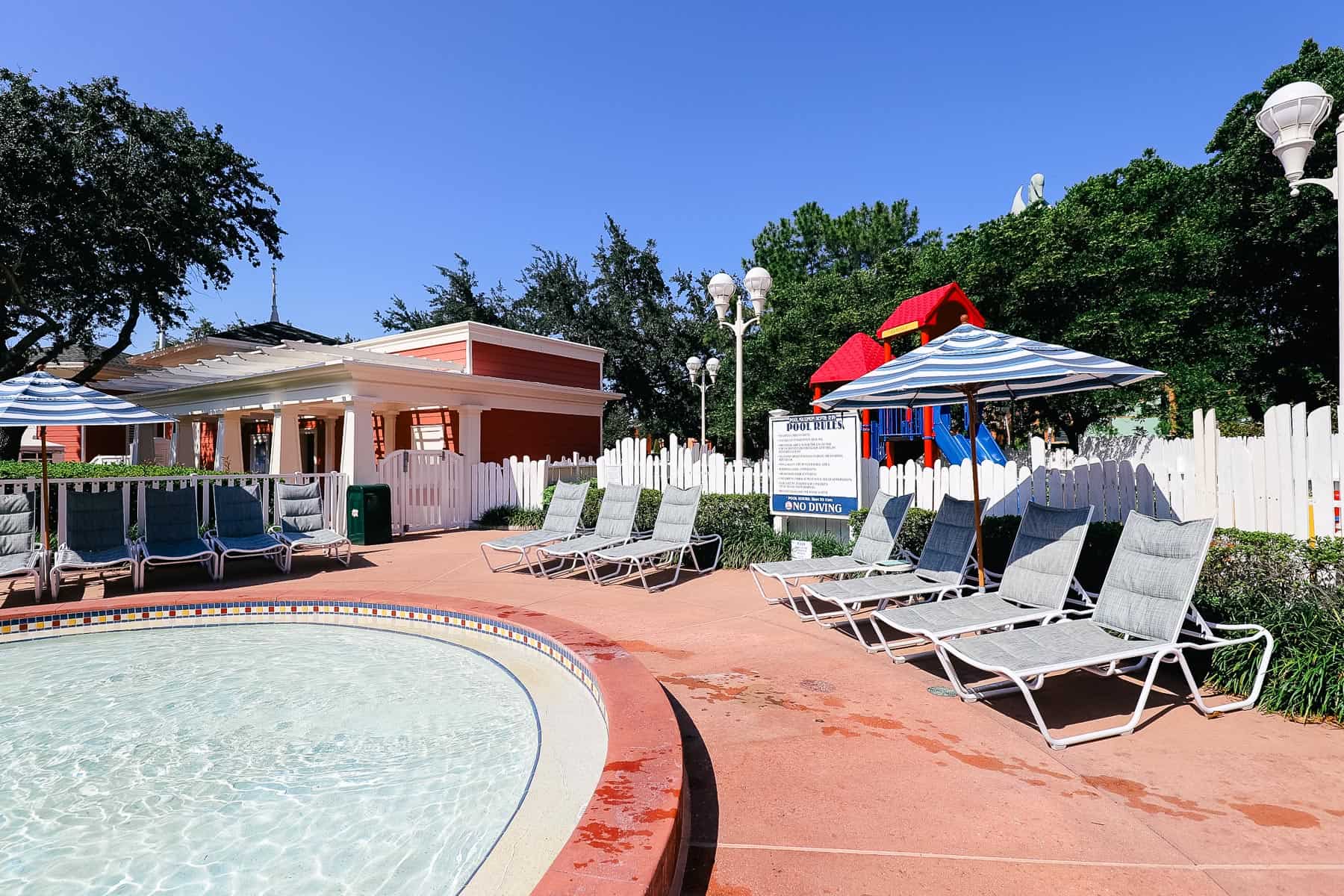 The kiddie pool at Boardwalk with the playground area behind it. 