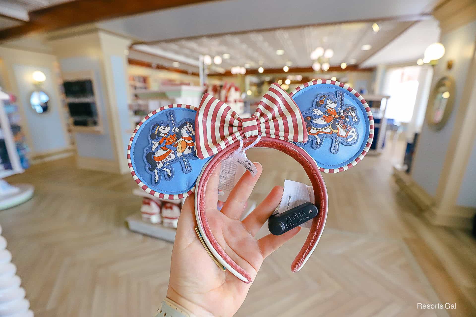 a pair of Minnie Ears with the carousel theme at Disney's Boardwalkk
