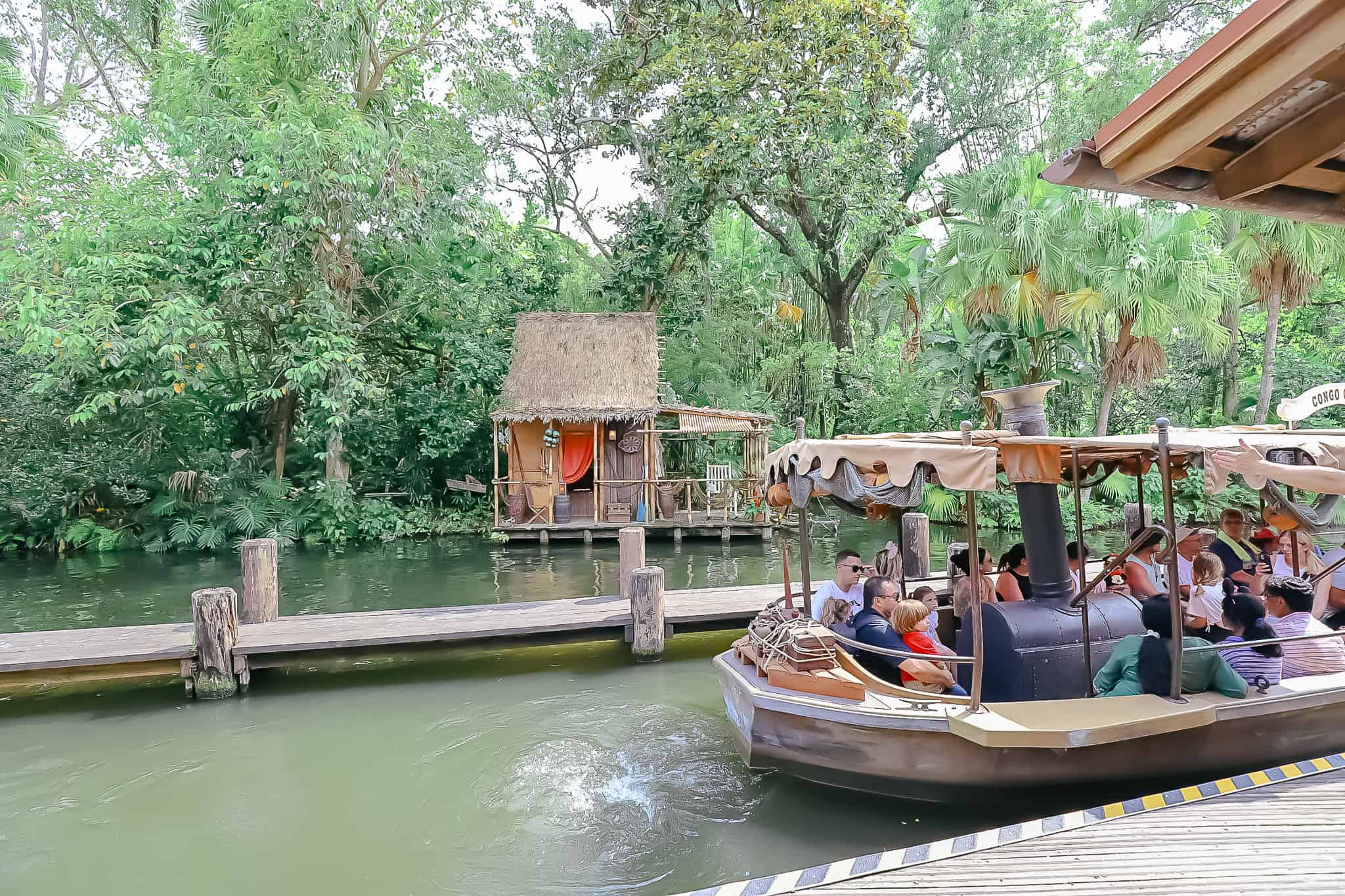 a boat of guests departing the dock 