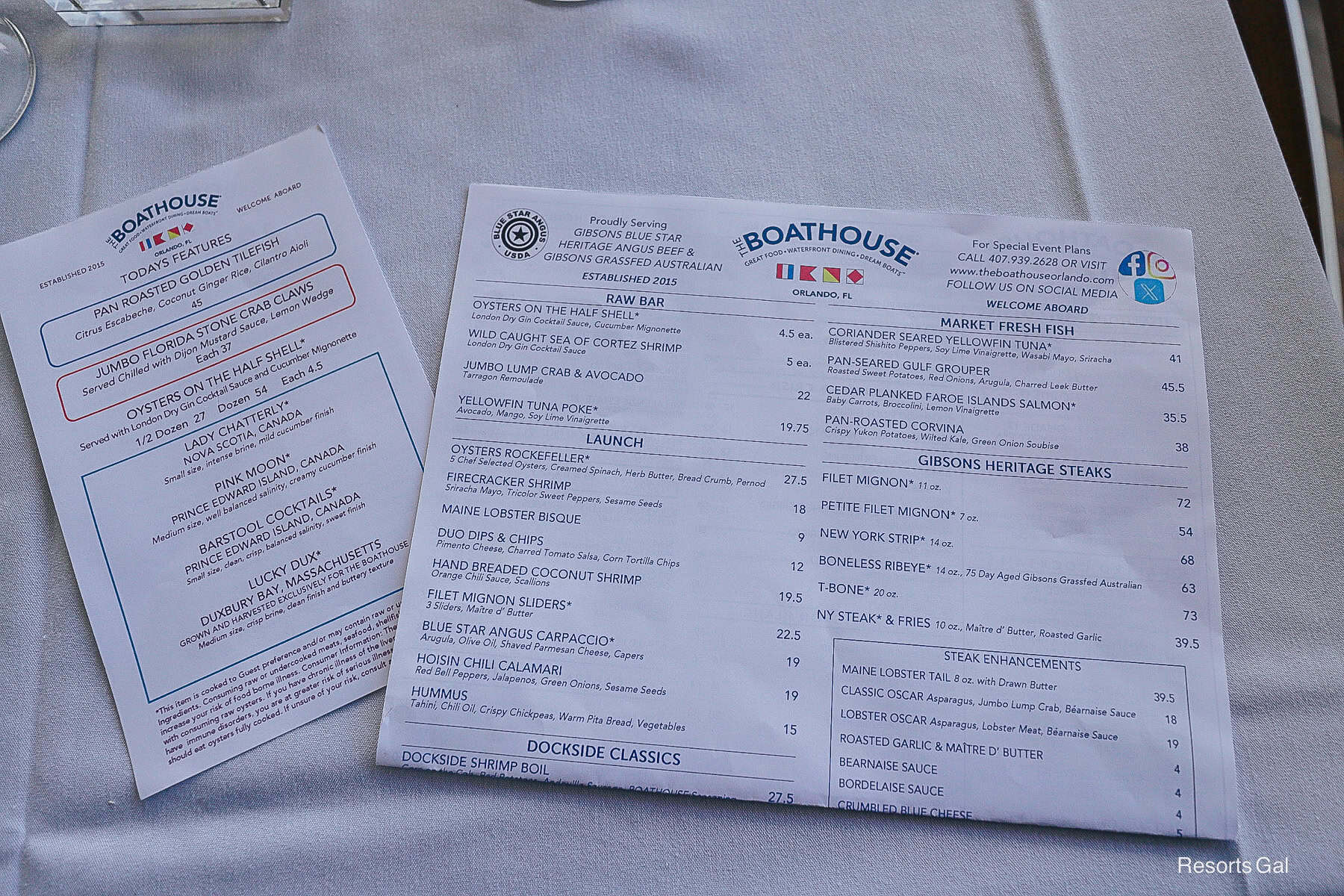 a folded Boathouse menu sitting on a table