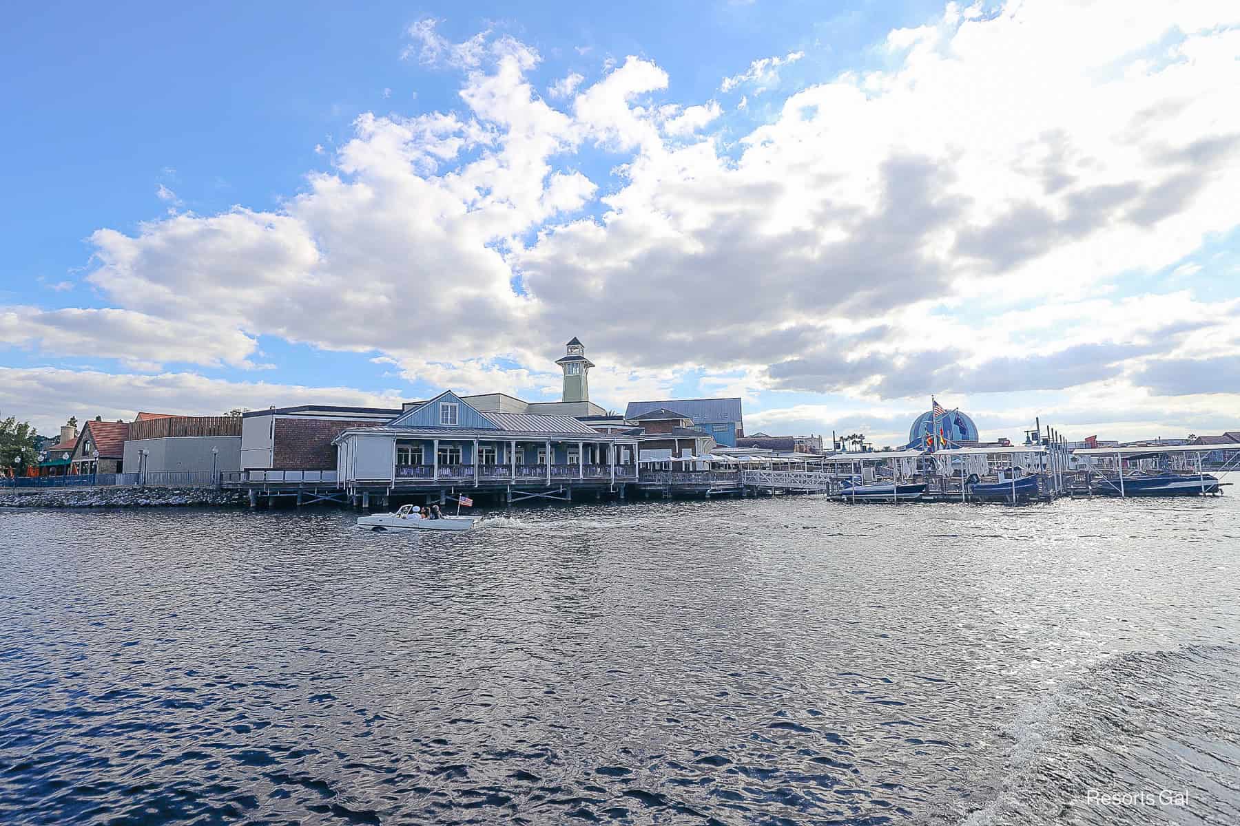 a view of The Boathouse Restaurant at Disney Springs from a water taxi 