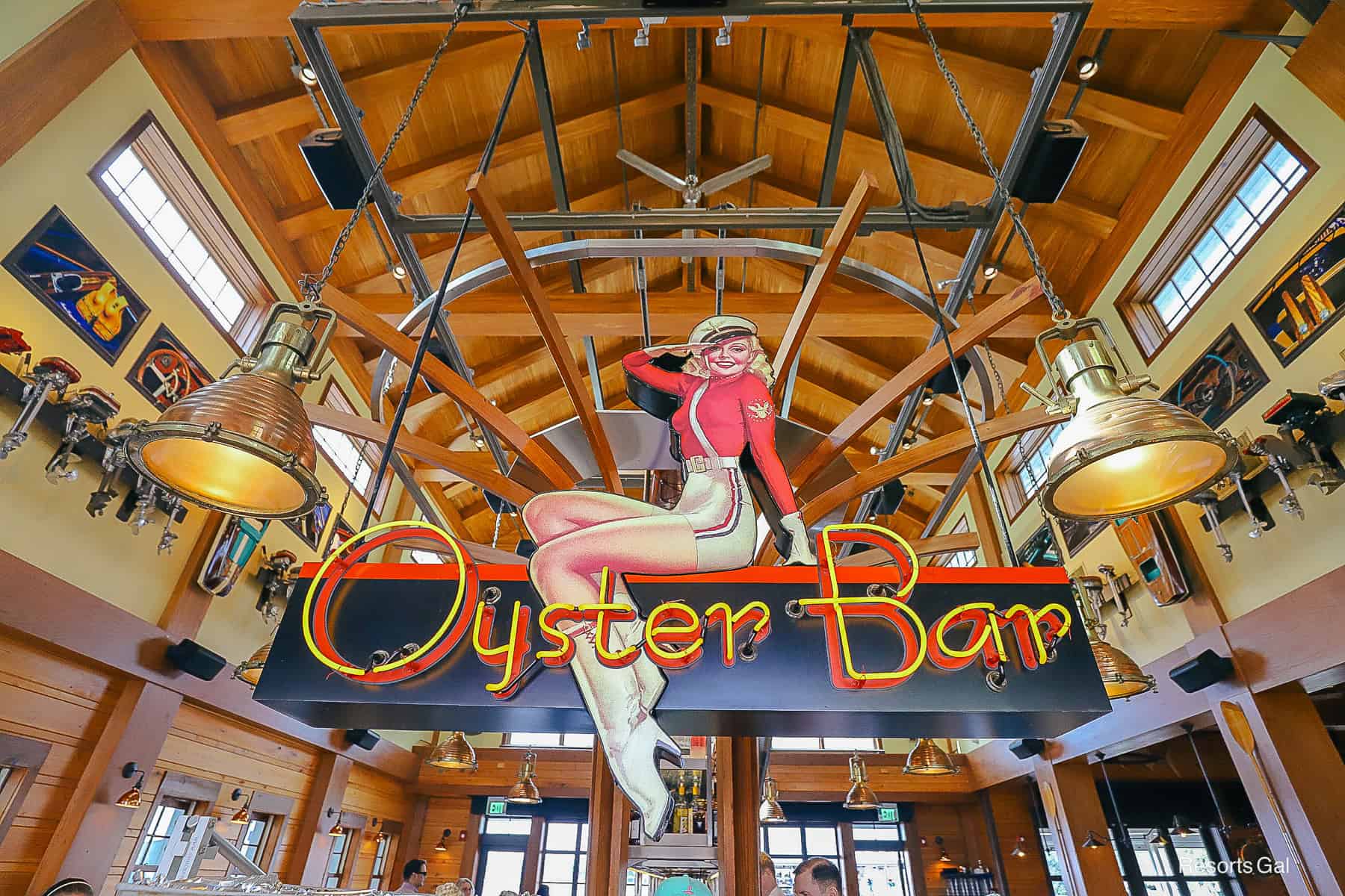 an Oyster Bar sign with red and yellow neon lights 