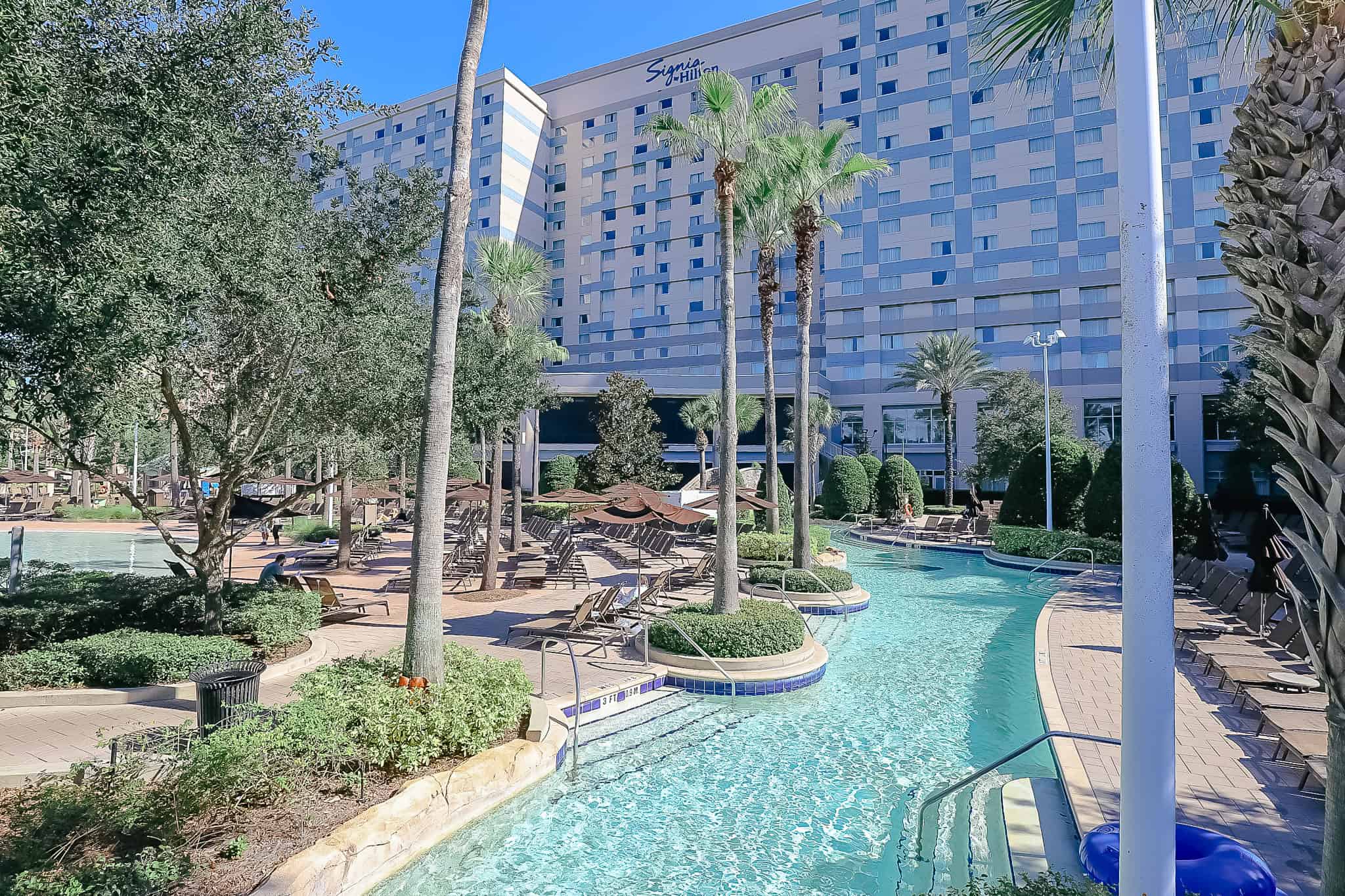 the lazy river passes behind the Hilton Signia at Bonnet Creek