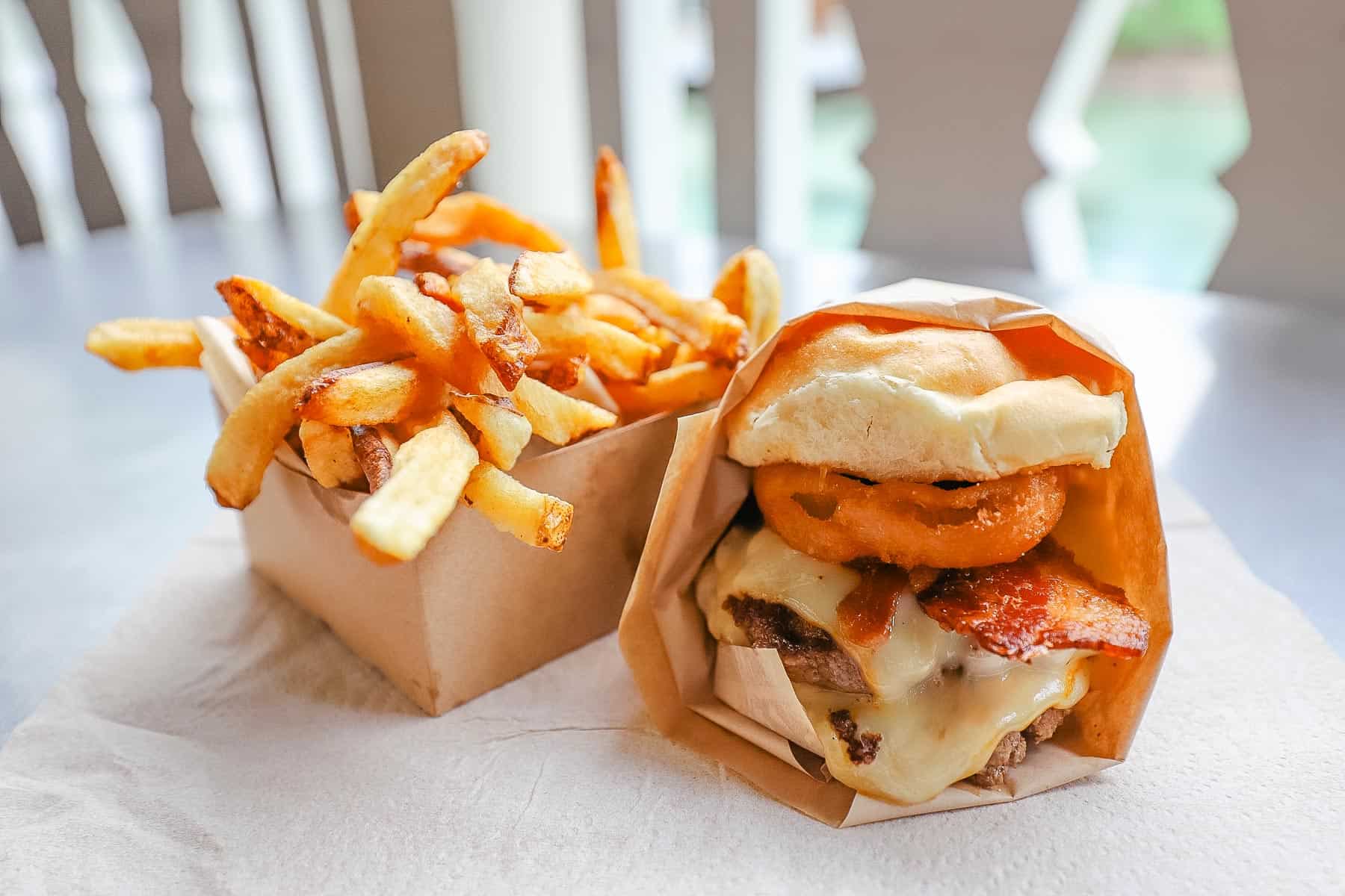 Barbecued burger with an order of fries 