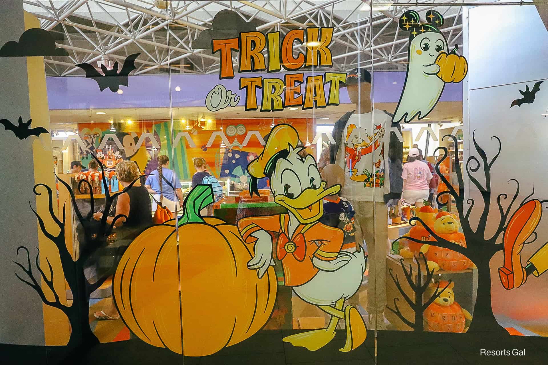 Donald Halloween window with pumpkin and a ghost