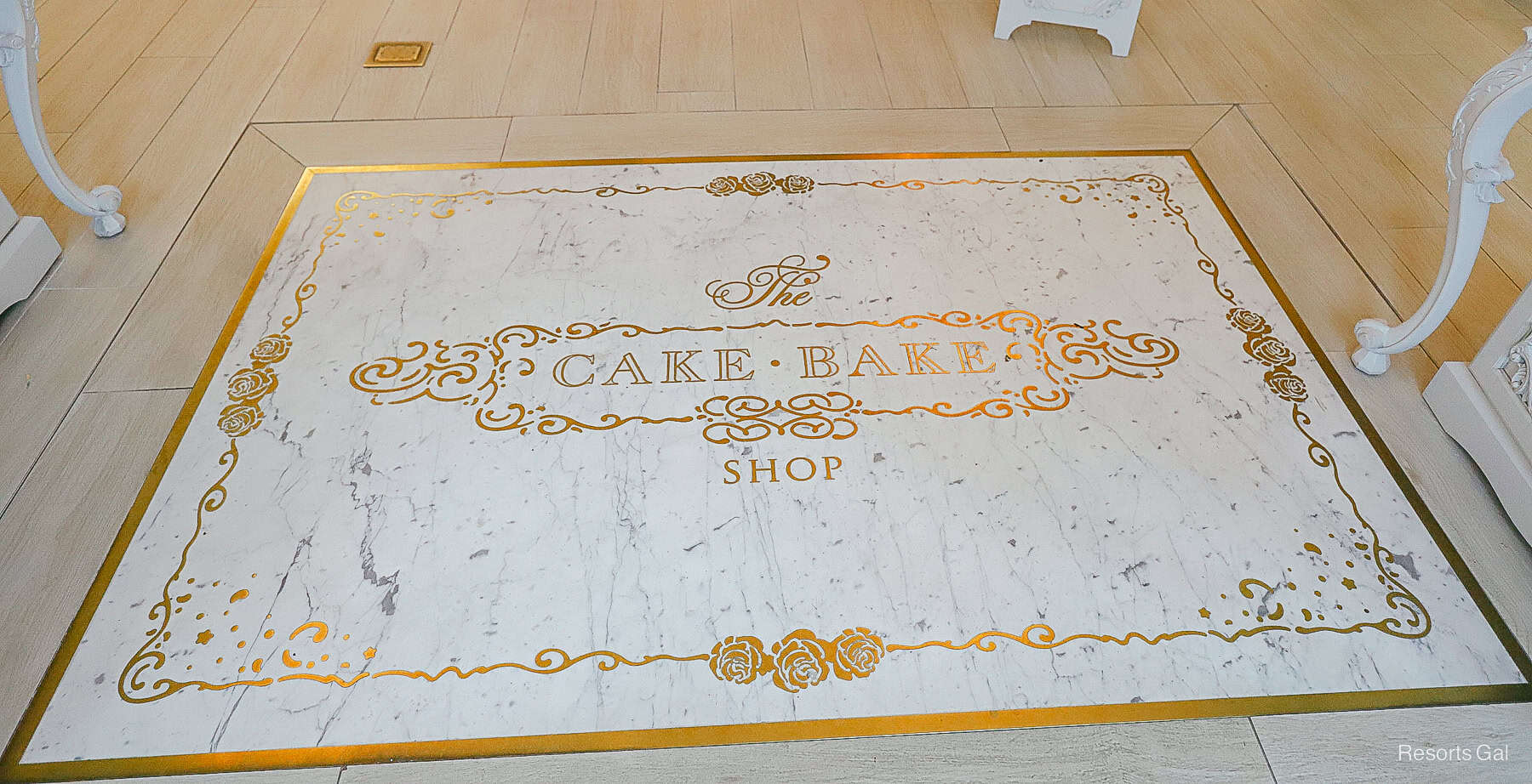 The Cake Bake Shop logo in the store's entrance