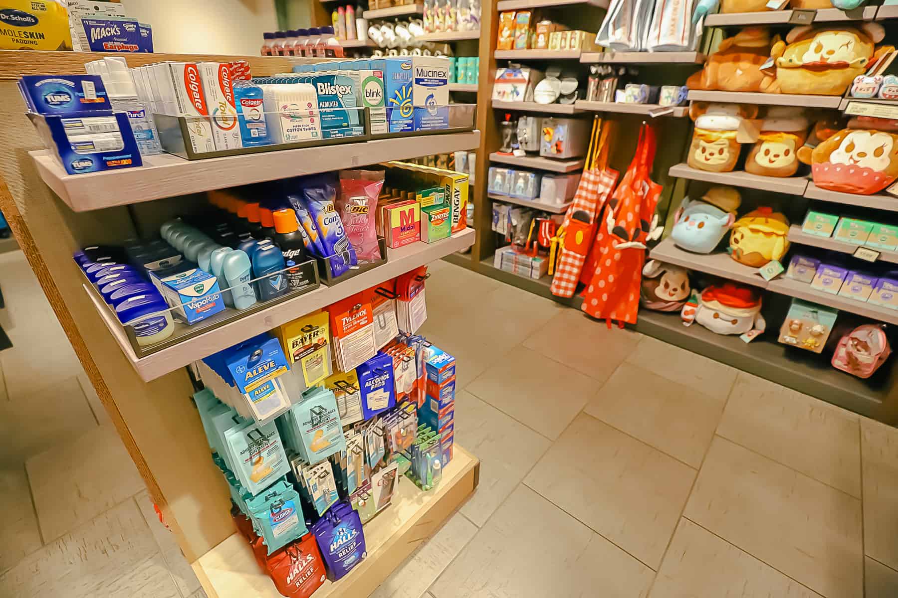 a display with health and beauty items including medicine, deodorant 