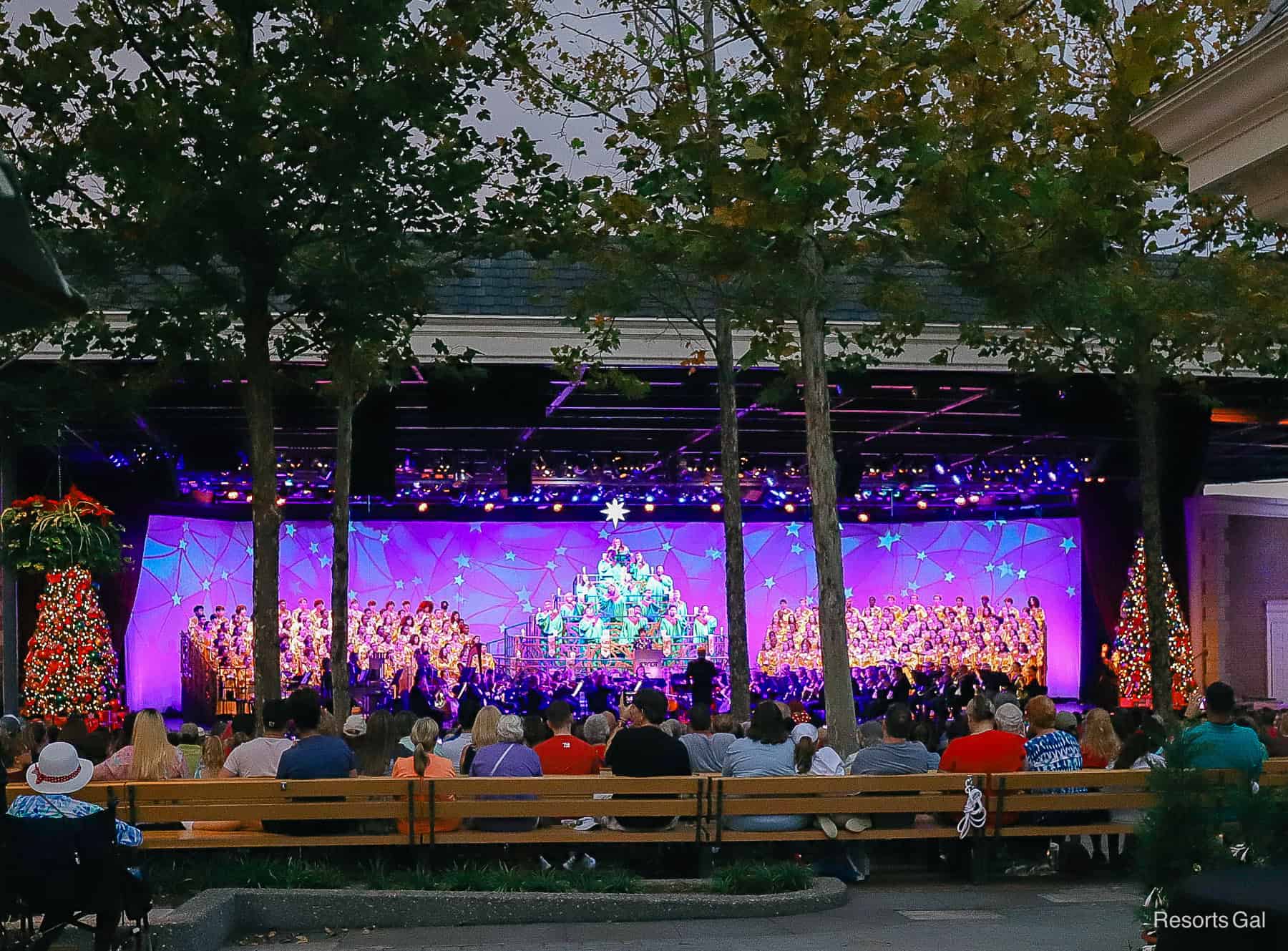 guests enjoying the Candlelight Processional at Epcot