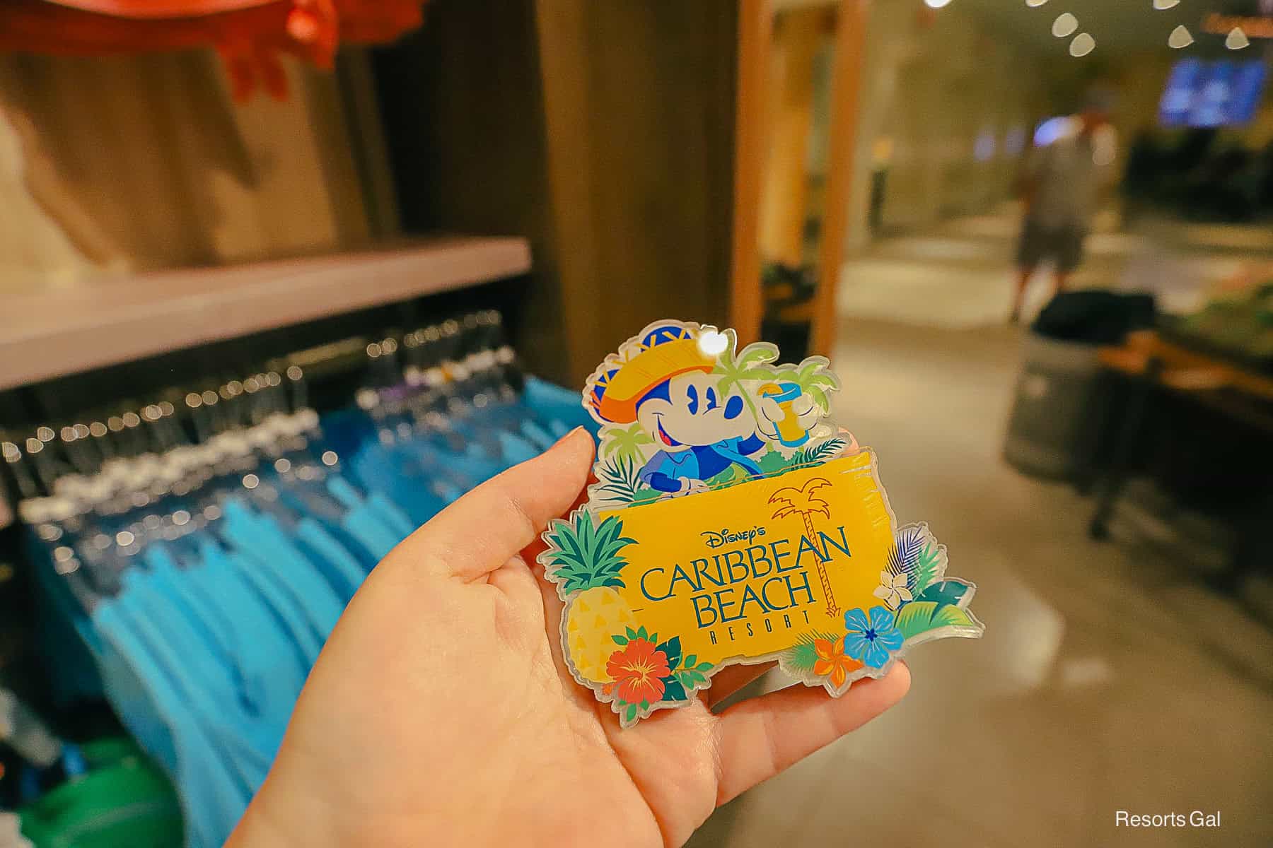 a magnet with Mickey Mouse and the Disney Caribbean Beach Resort logo