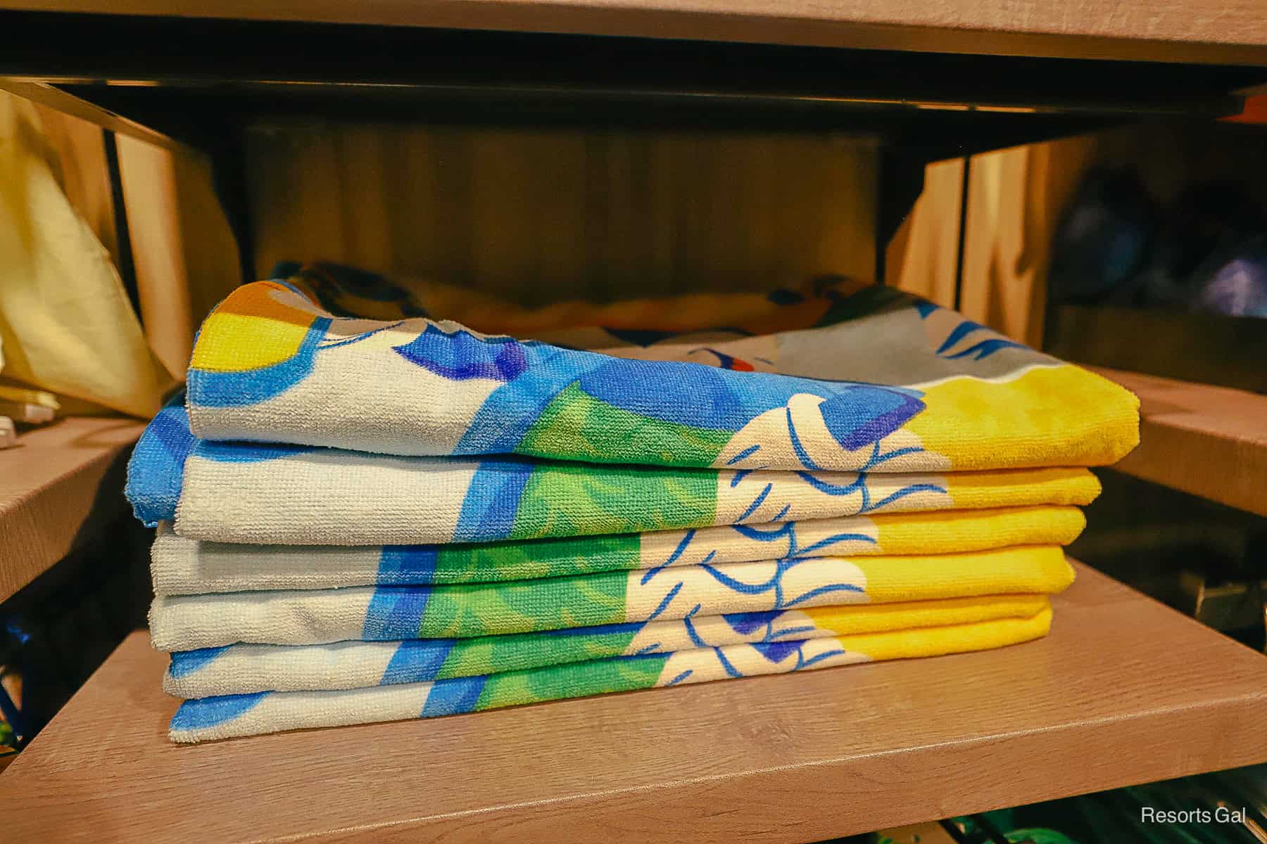 a folded stack of beach towels 