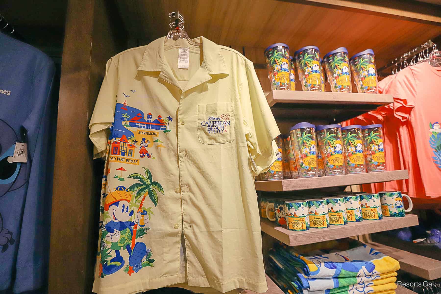 the front of a button-up shirt branded to Disney's Caribbean Beach Resort 