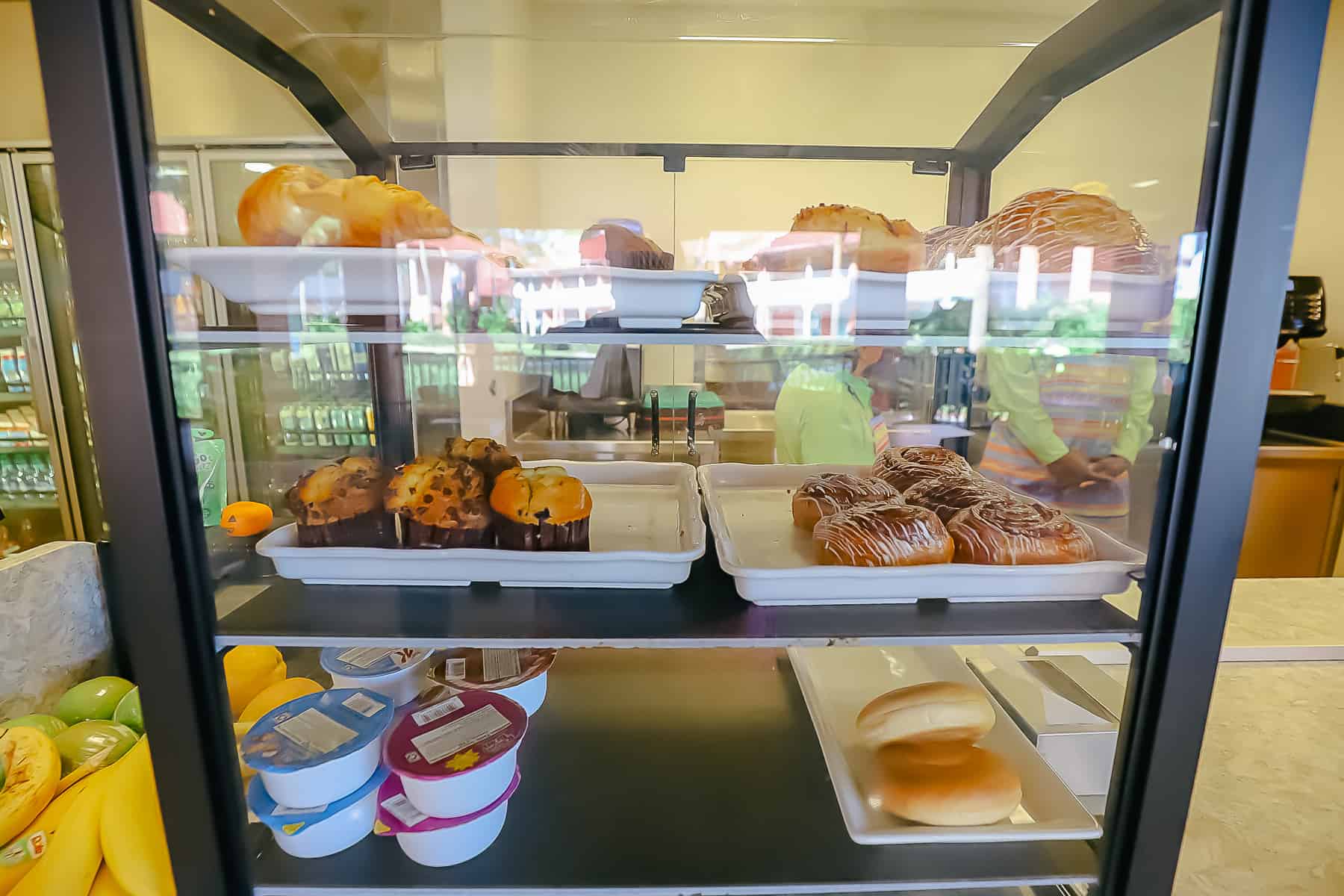 pastry selection with croissants, turnovers, muffins, bagels, and cinnamon rolls