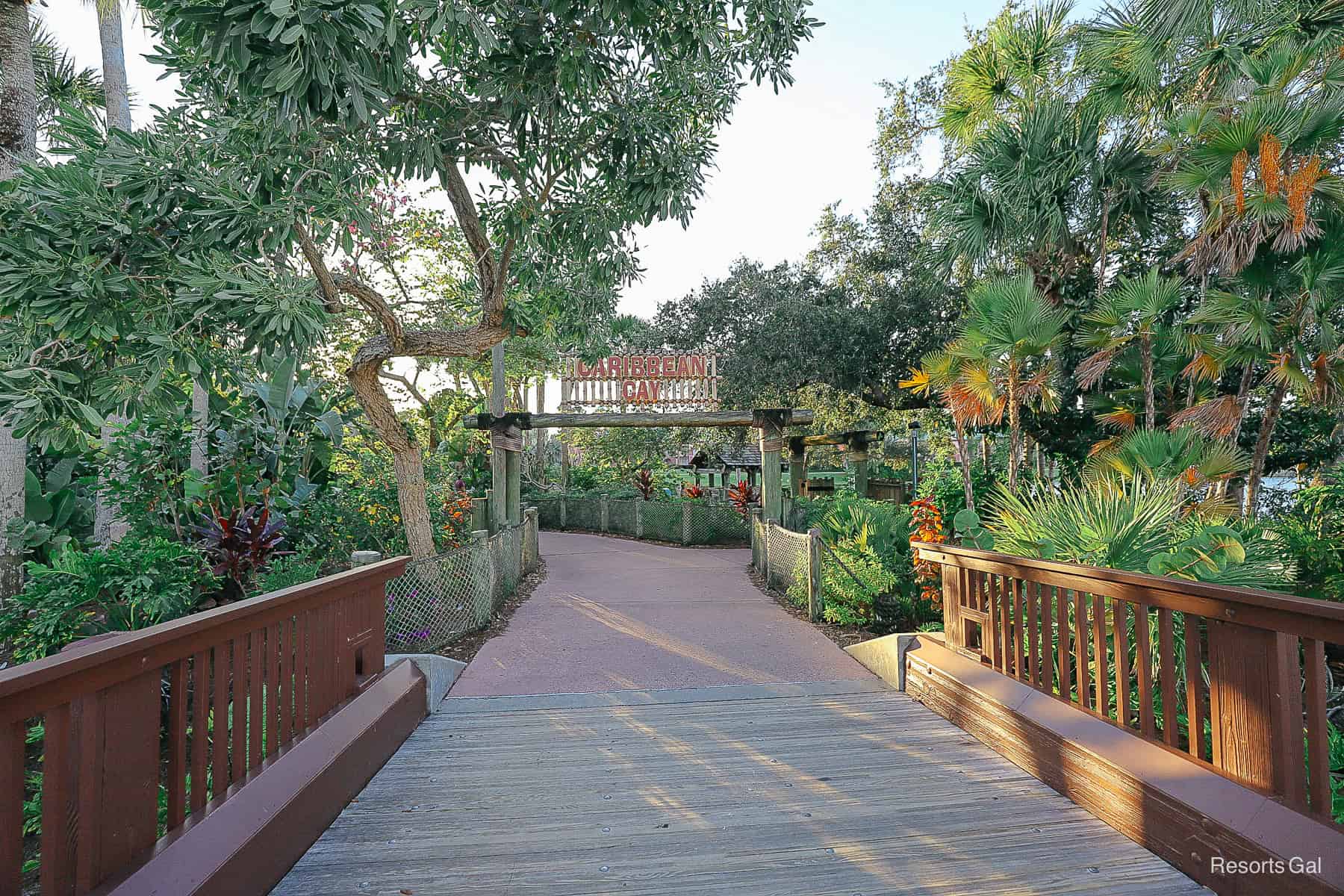 a wooden boardwalk leading to Caribbean Cay