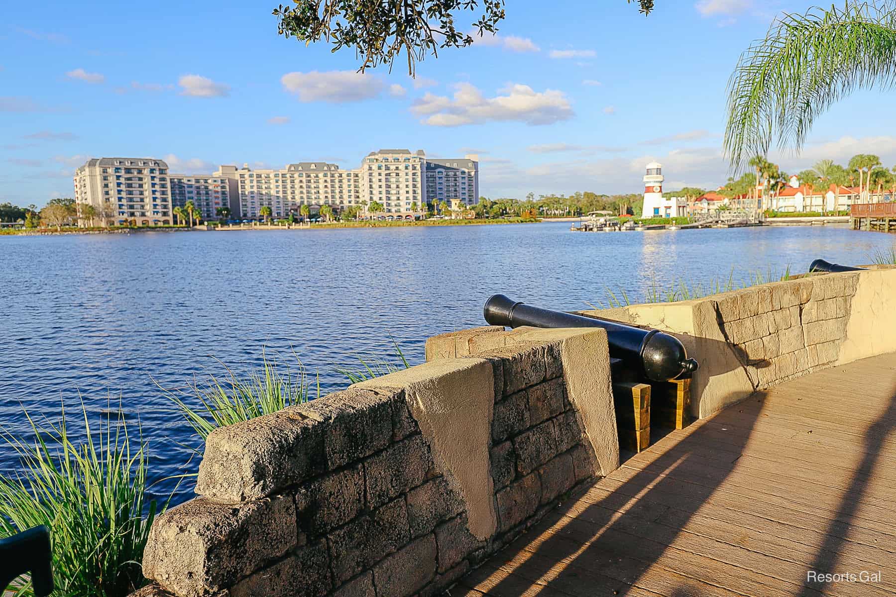 a faux cannon positioned toward the lake