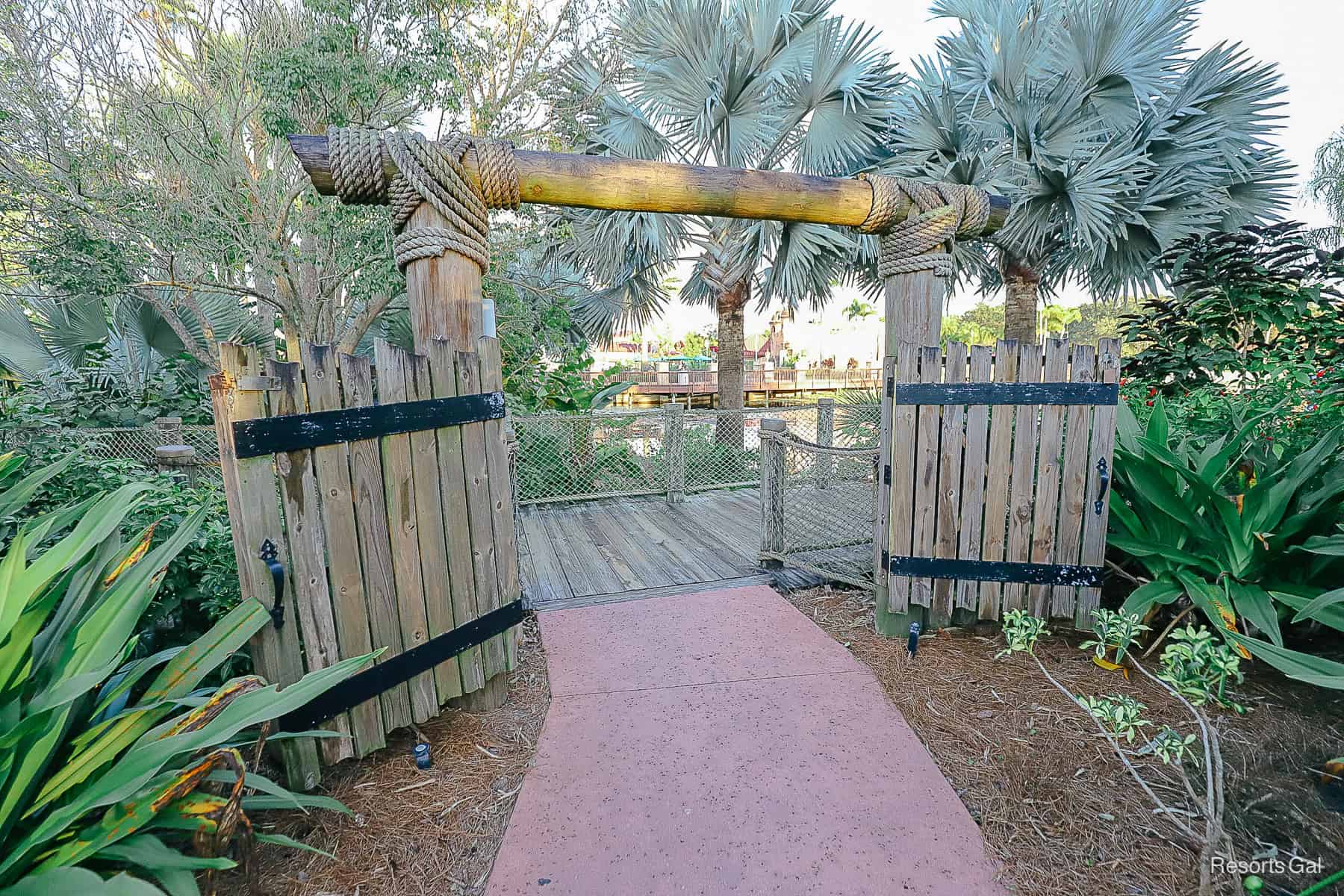 an entryway to a private walkway on the island