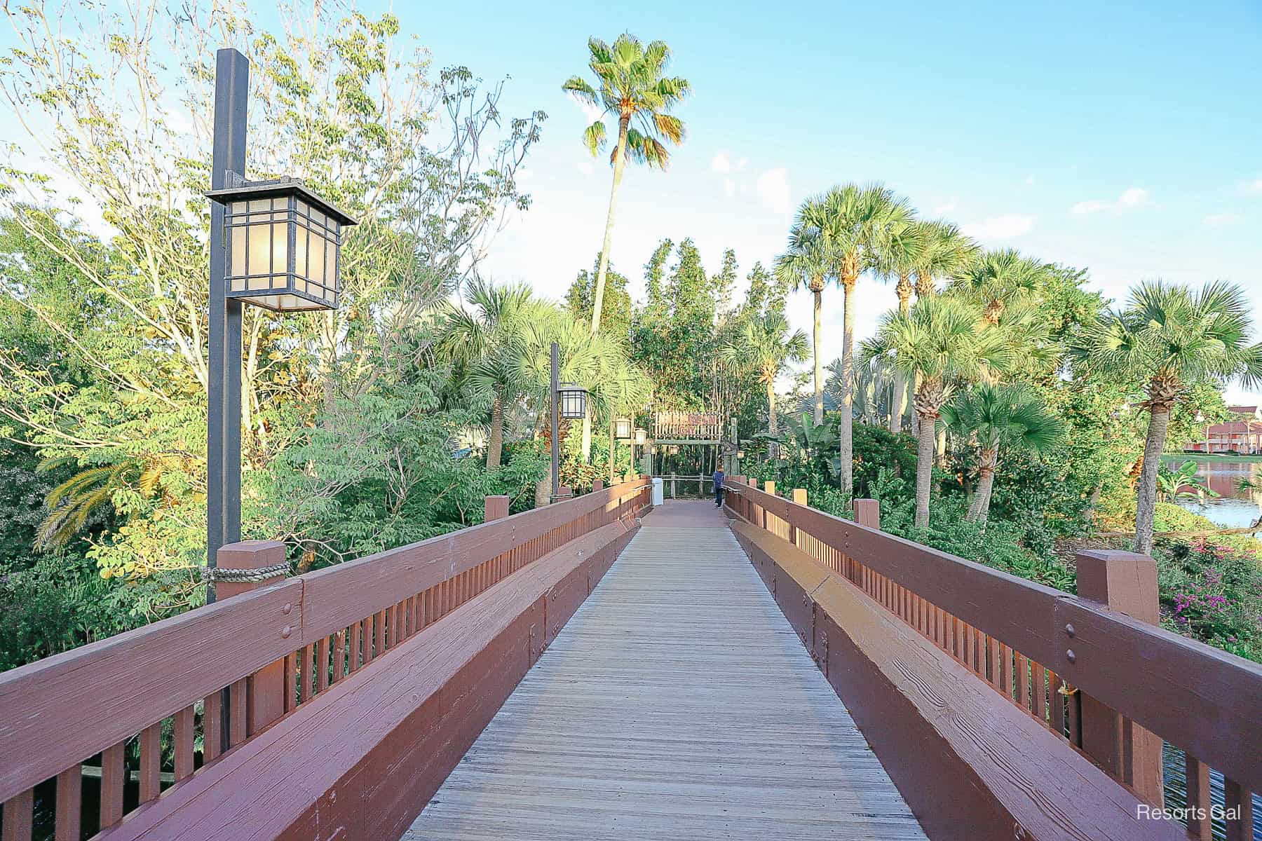 the bridge is painted brown and has lanterns where guests can see at night