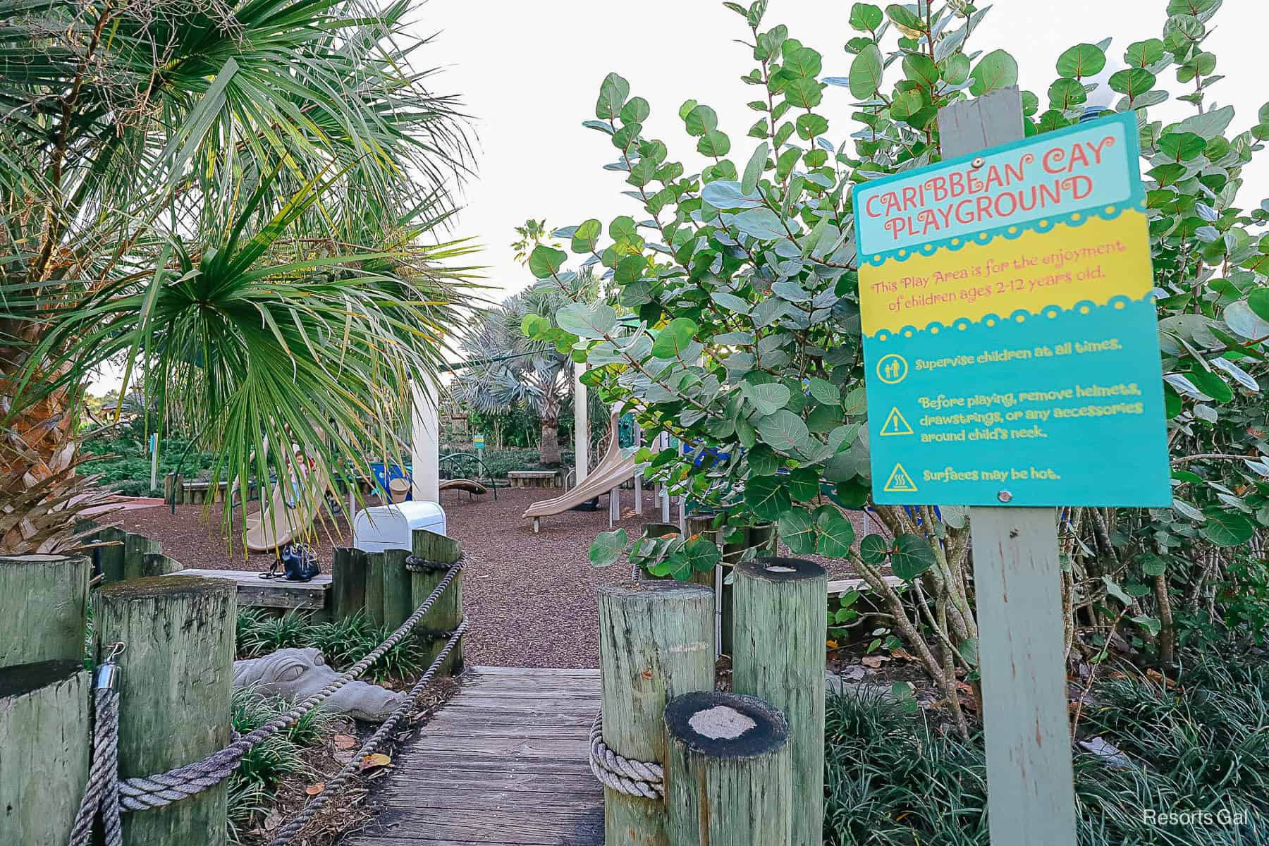 a sign that tells age limits and rules for the Caribbean Cay Playground