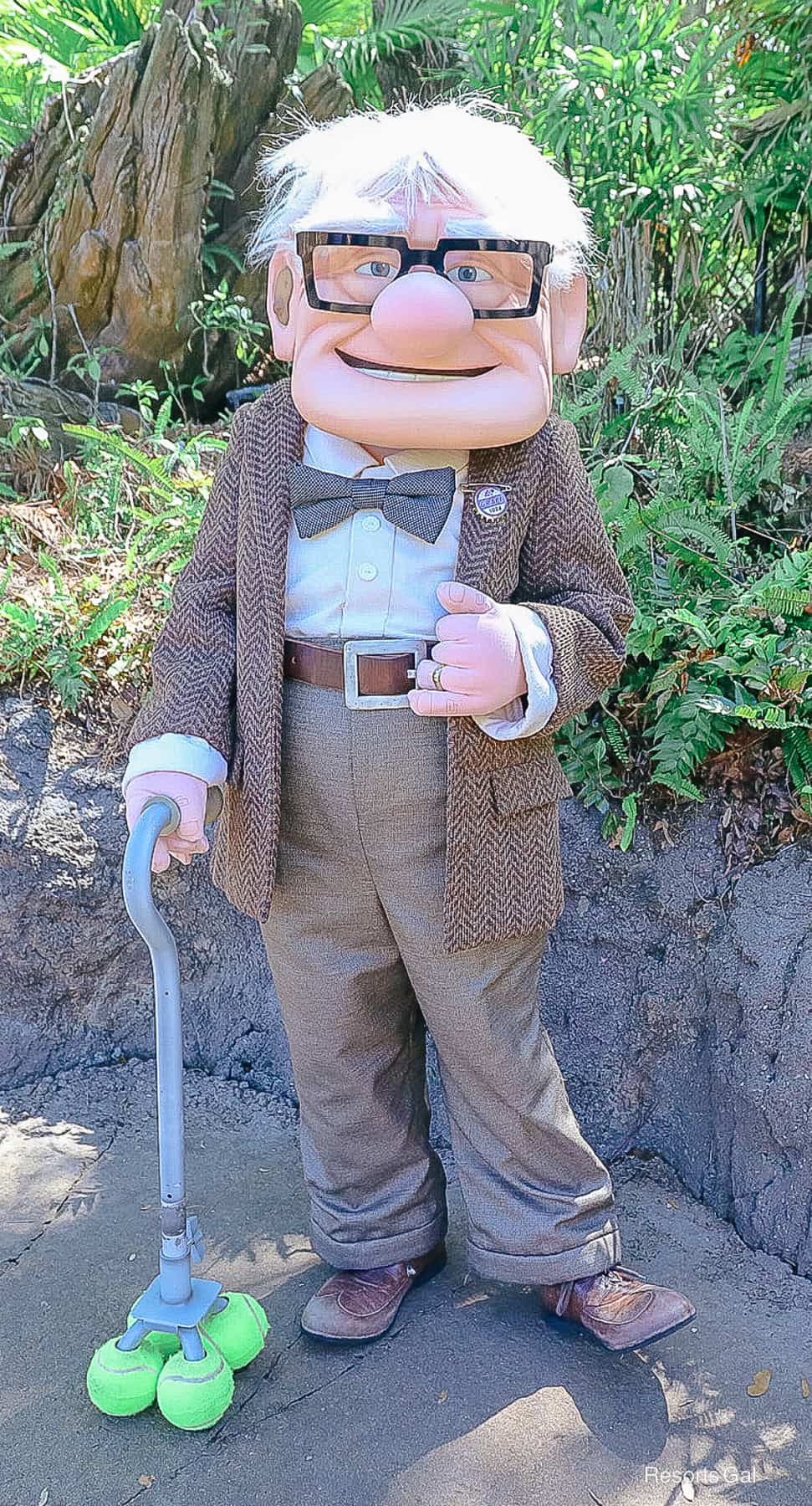 Carl Fredricksen meets guests on the Discovery Island Trails