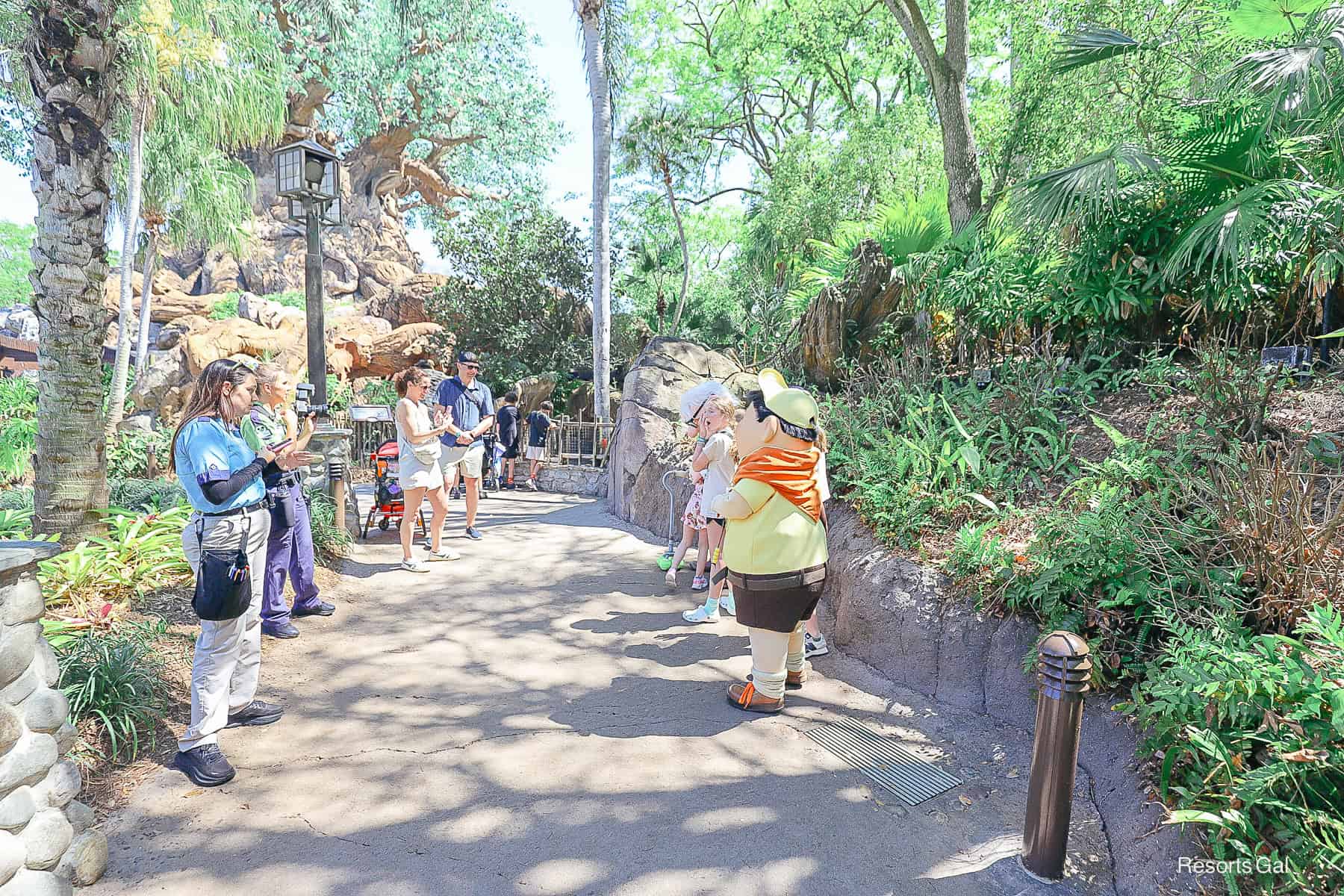 Dug and Mr. Fredricksen meeting guests at Disney's Animal Kingdom