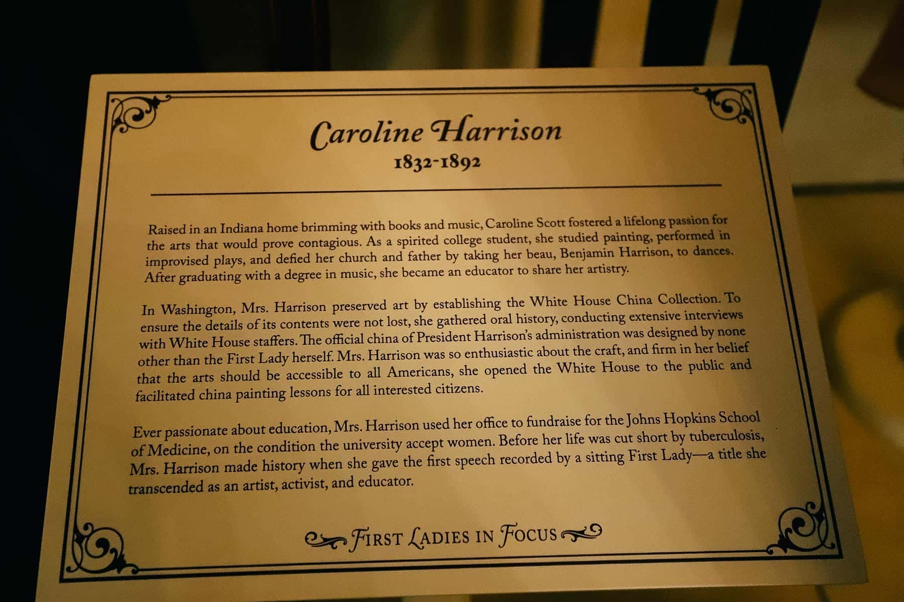 A sign that tells how Caroline Harrison was an artist, activist, and educator. 