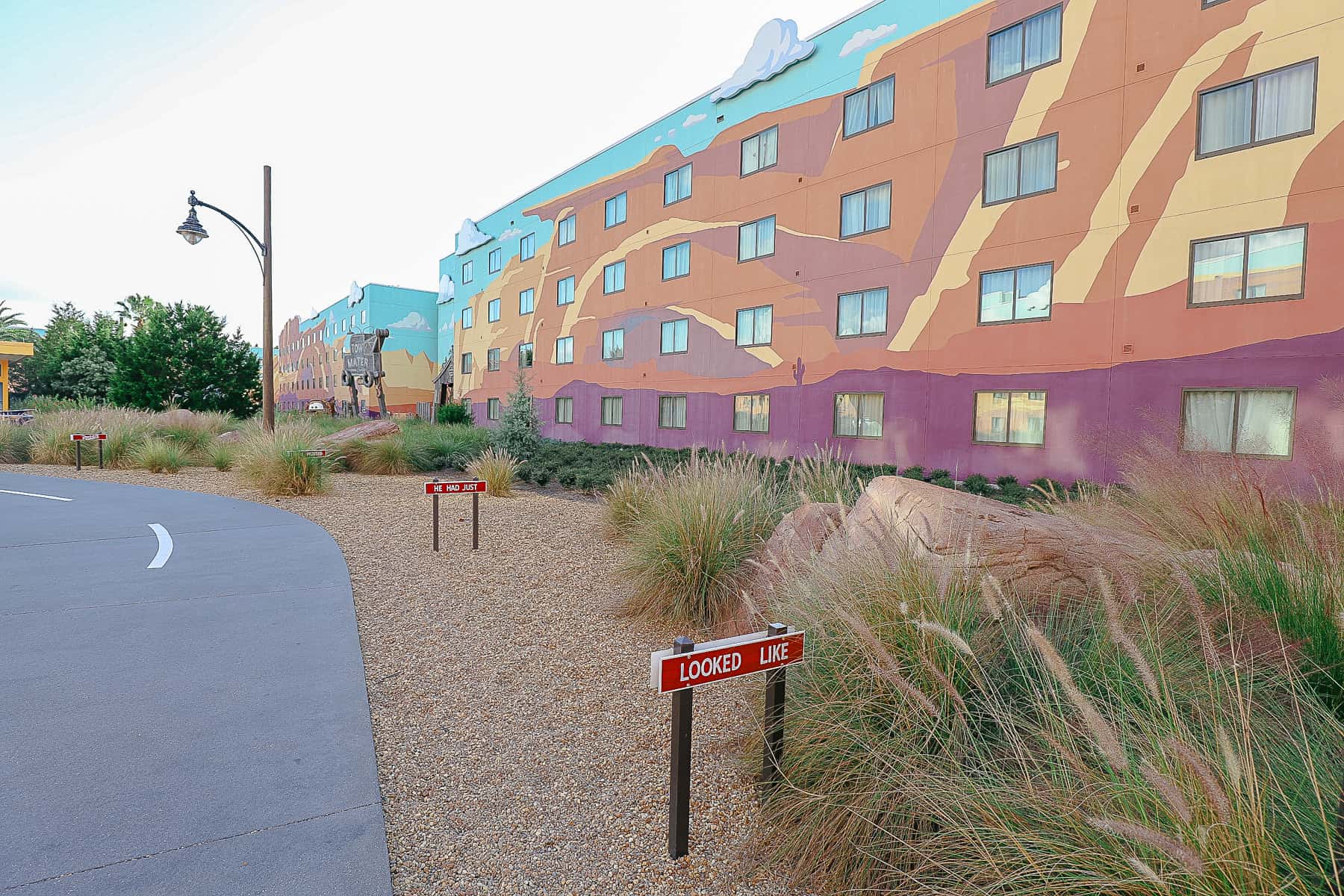 Route 66 sidewalk looks like a road with desert landscaping 