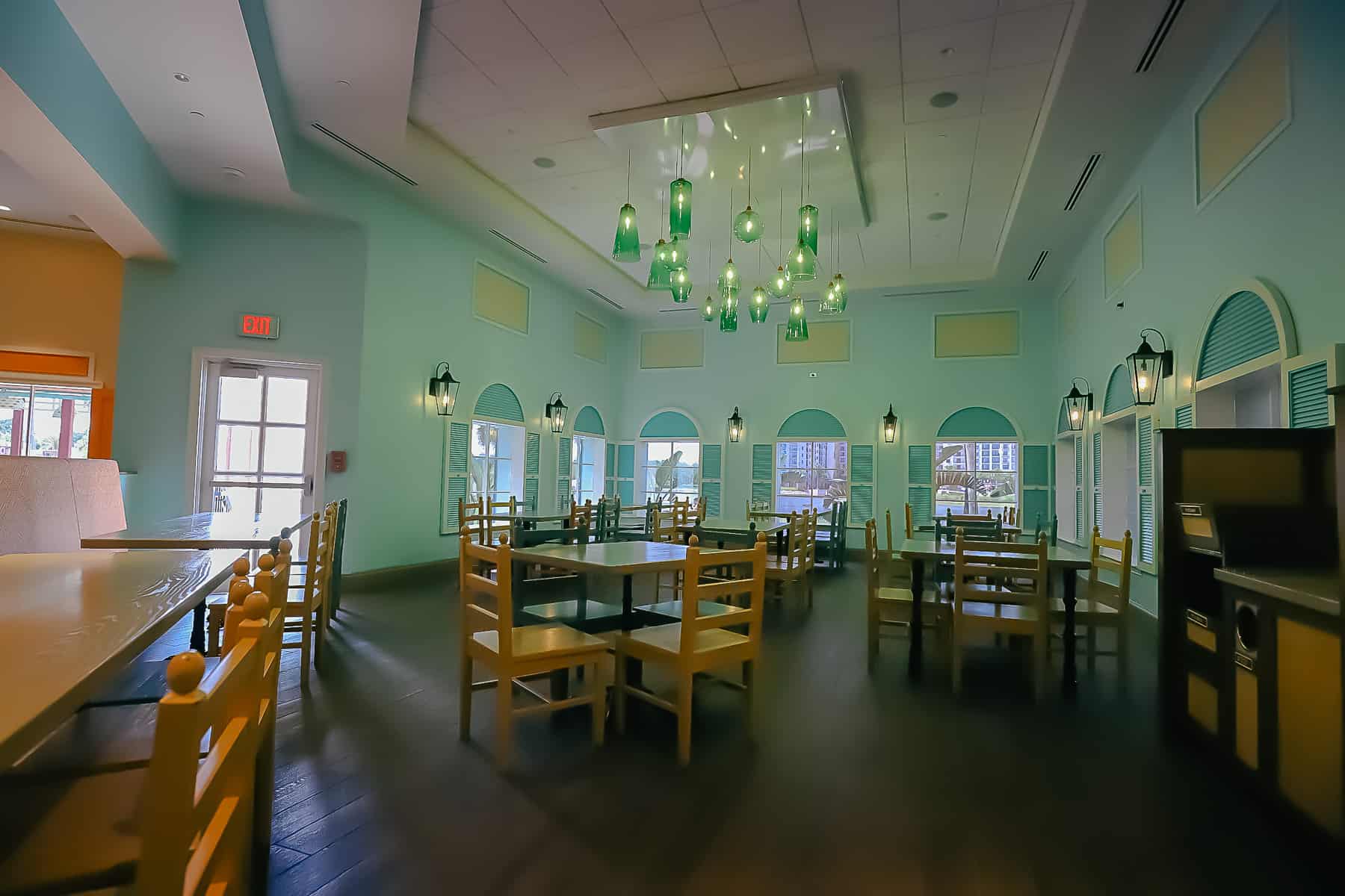 a bright sea foam colored dining room at Centertown Market 