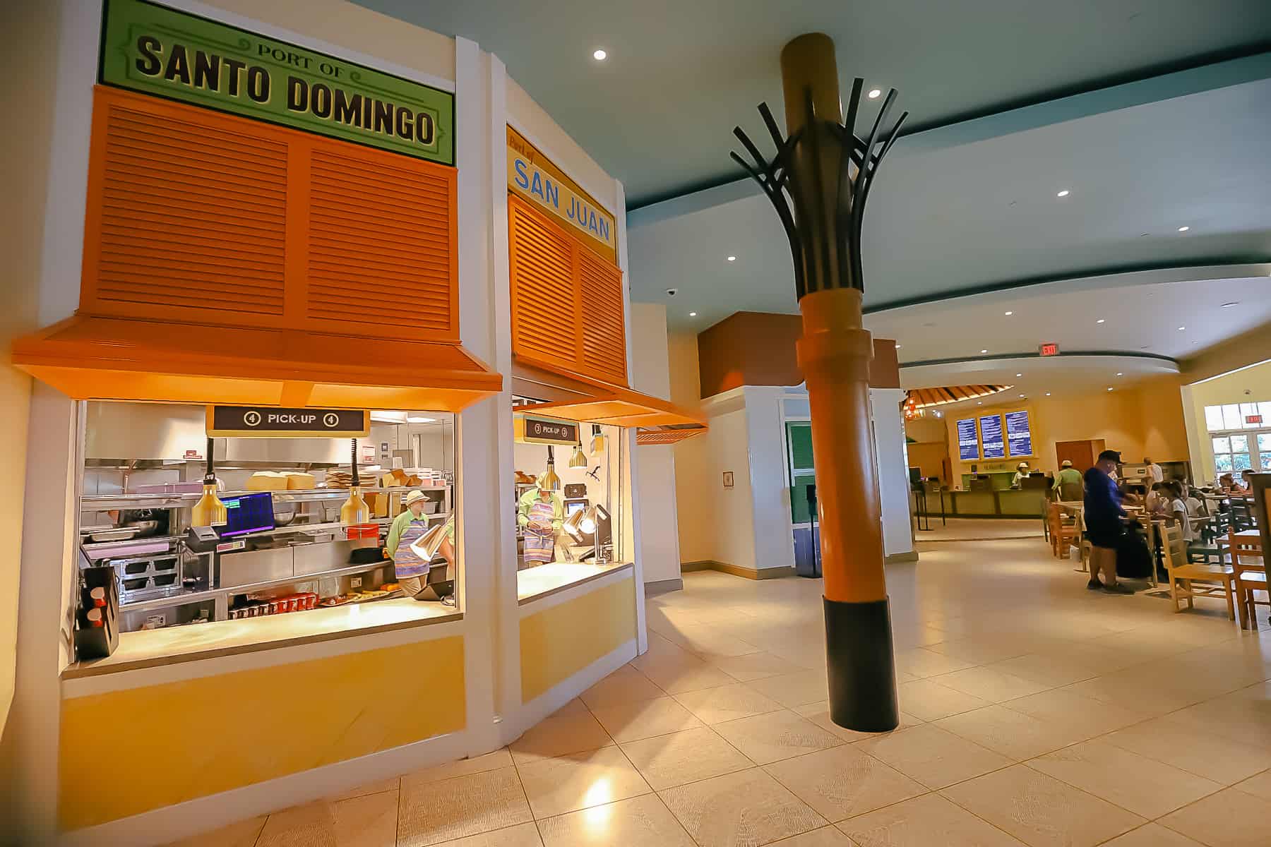 shows the food court windows where guests pick up their orders 