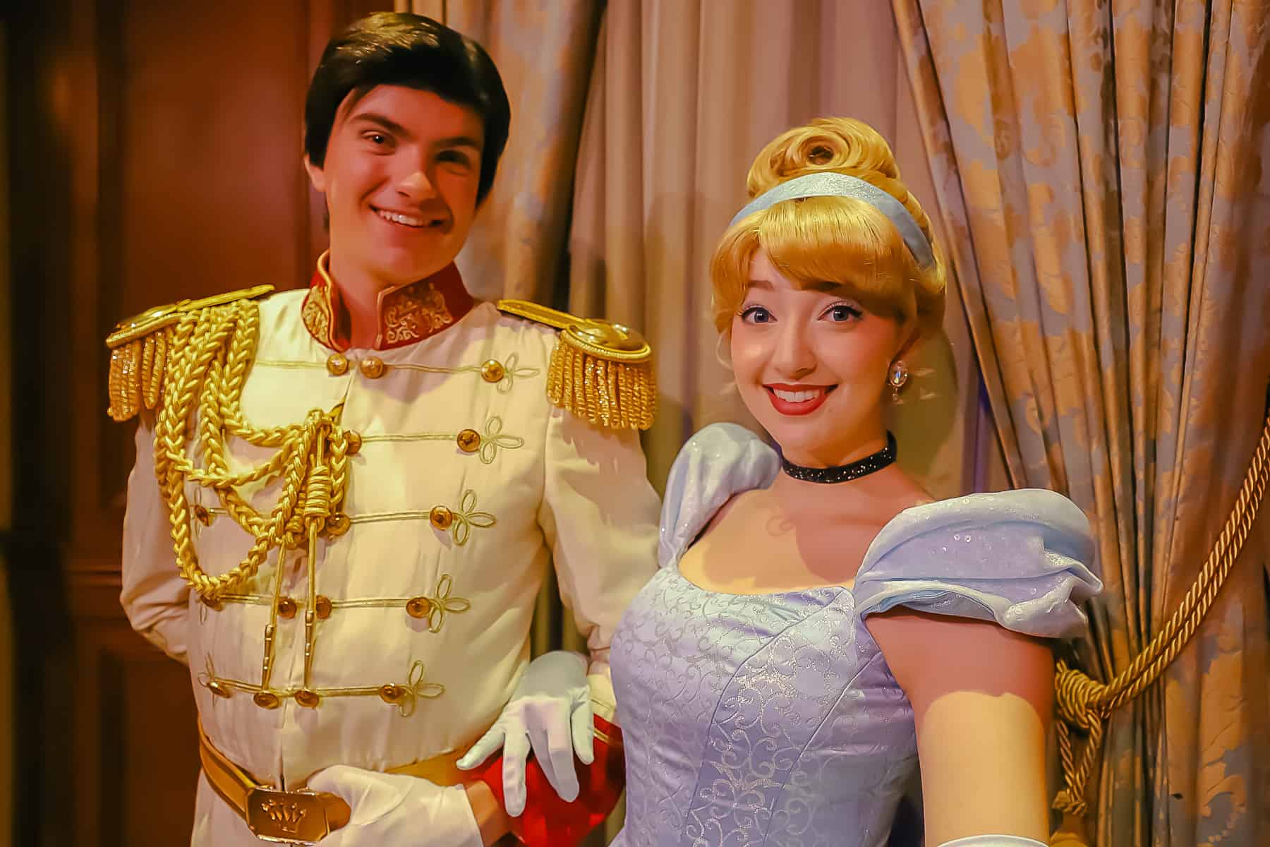 Cinderella with Prince Charming in formal attire