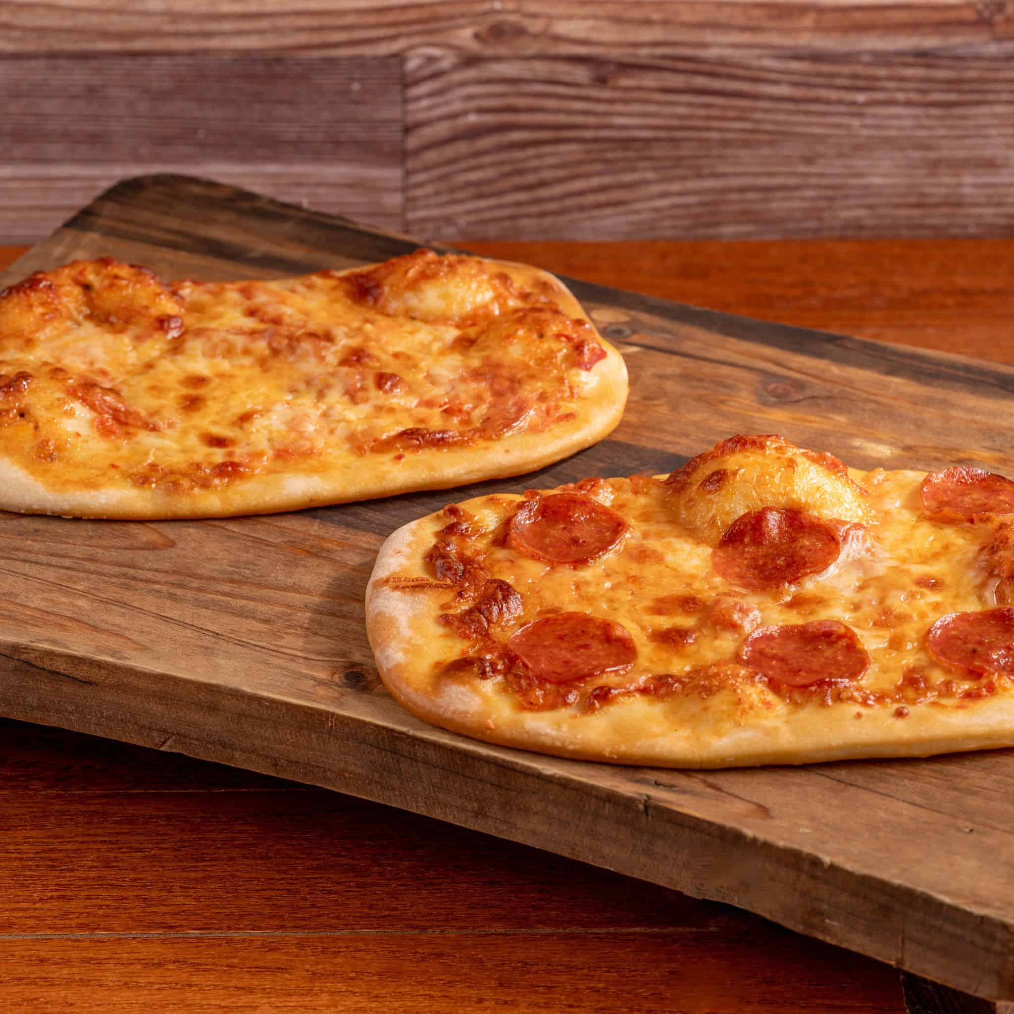 a flatbread in cheese and pepperoni 