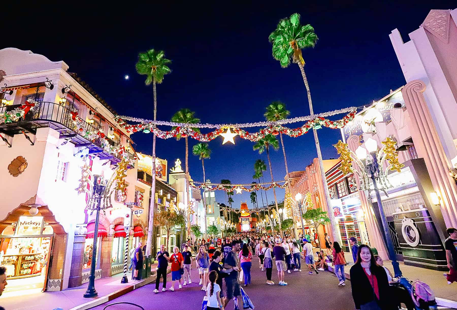 a holiday scene down Hollywood Boulevard at Hollywood Studios