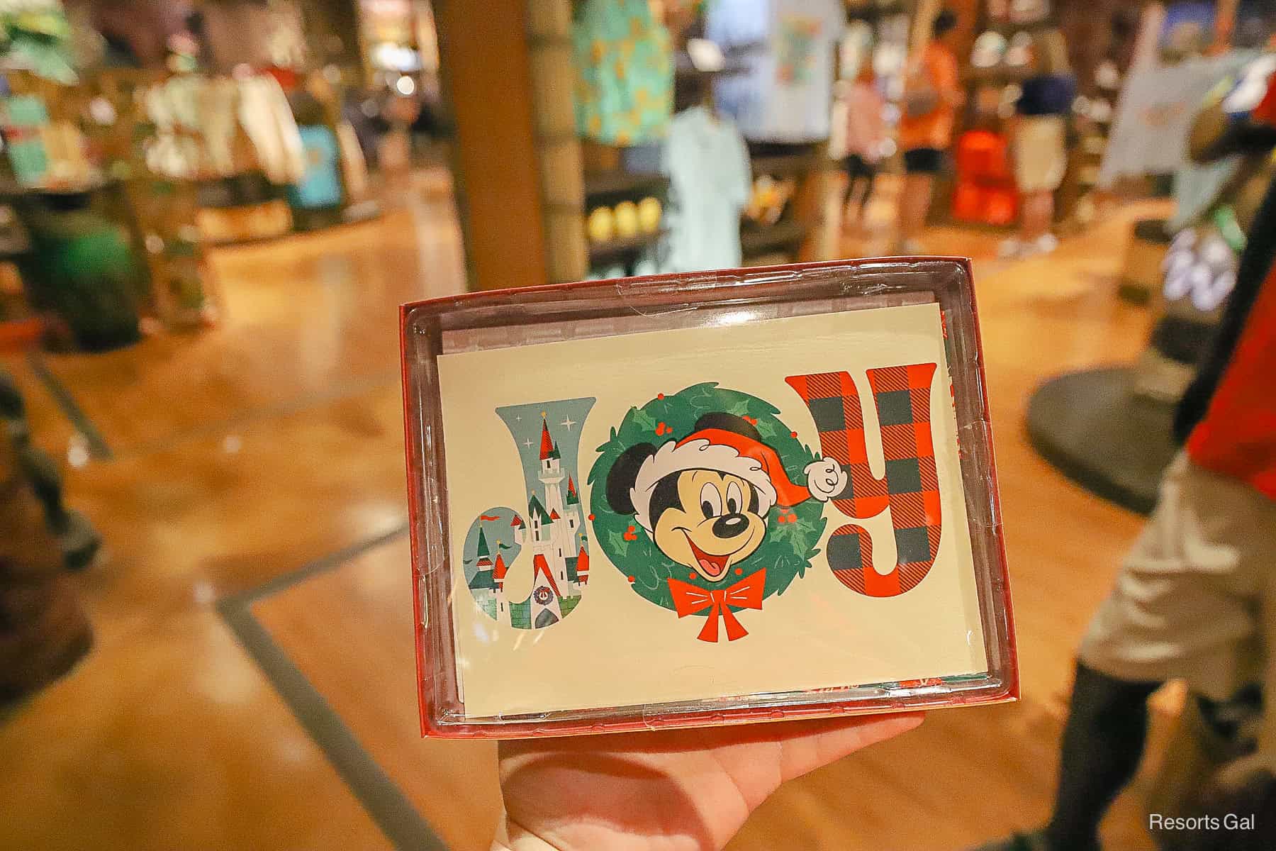 a set of cards with JOY on the cover and Mickey Mouse. 