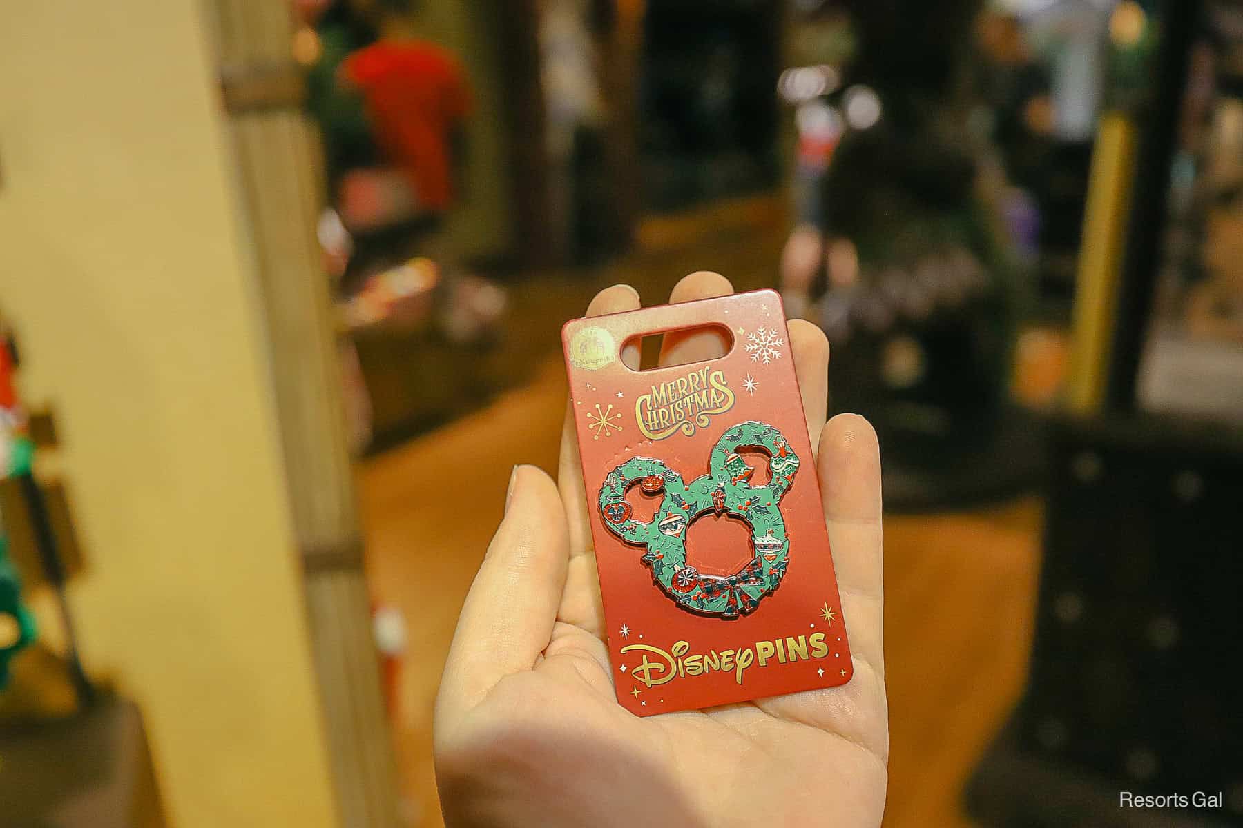 a wreath pin in a Mickey Mouse shape 