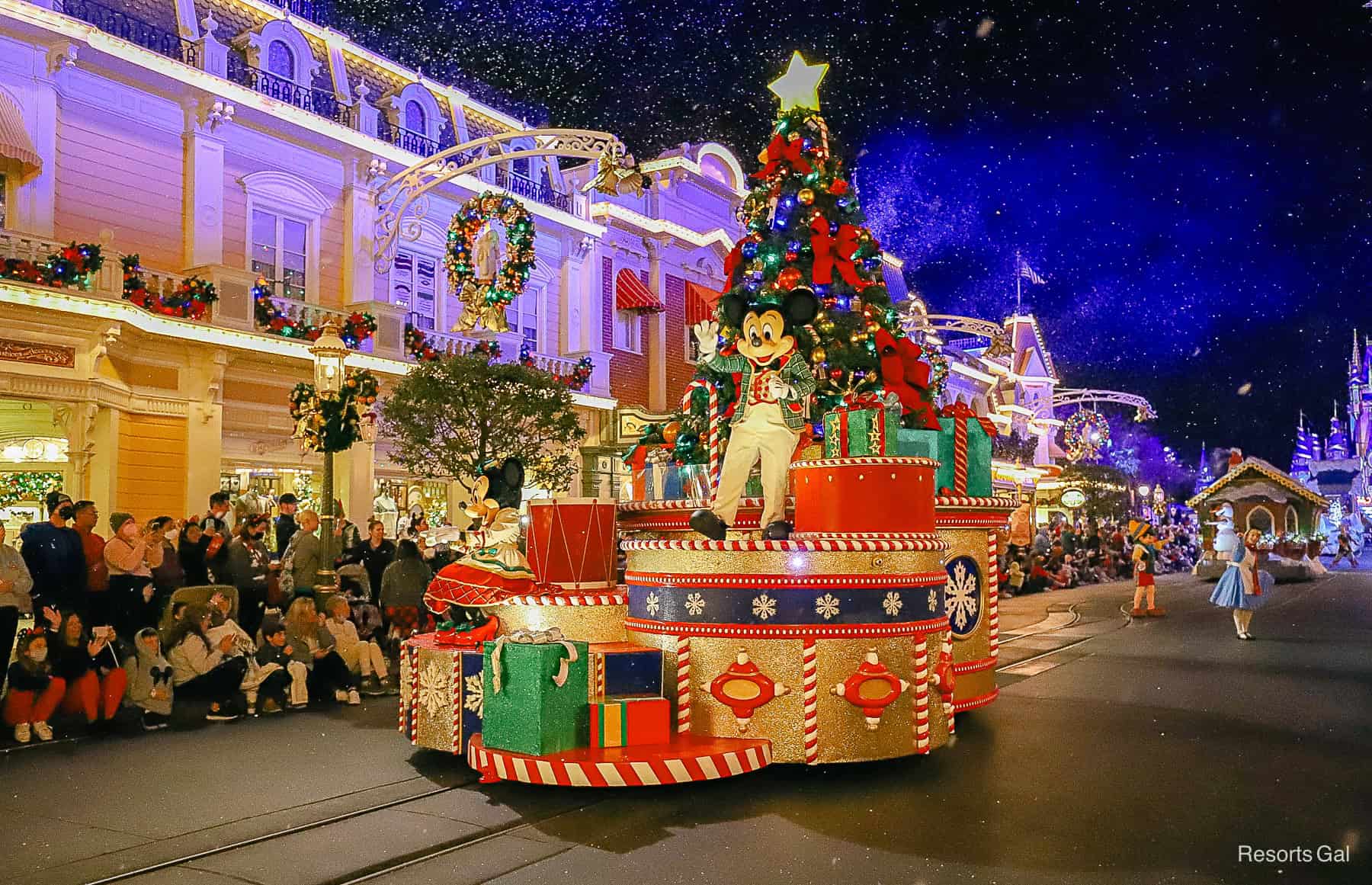 Mickey Mouse coming down Main Street USA on the Christmas parade float in December. 