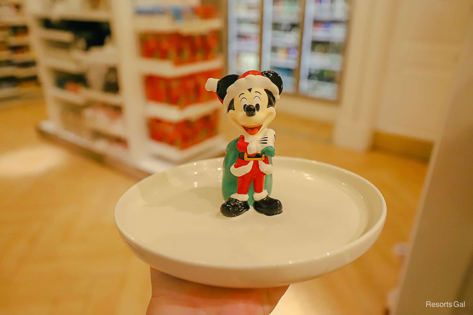 Mickey in the center of a decorative holiday dish