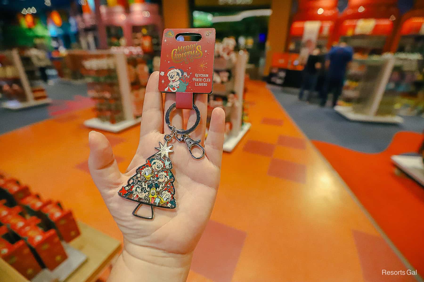 a keychain with numerous characters in holiday attire
