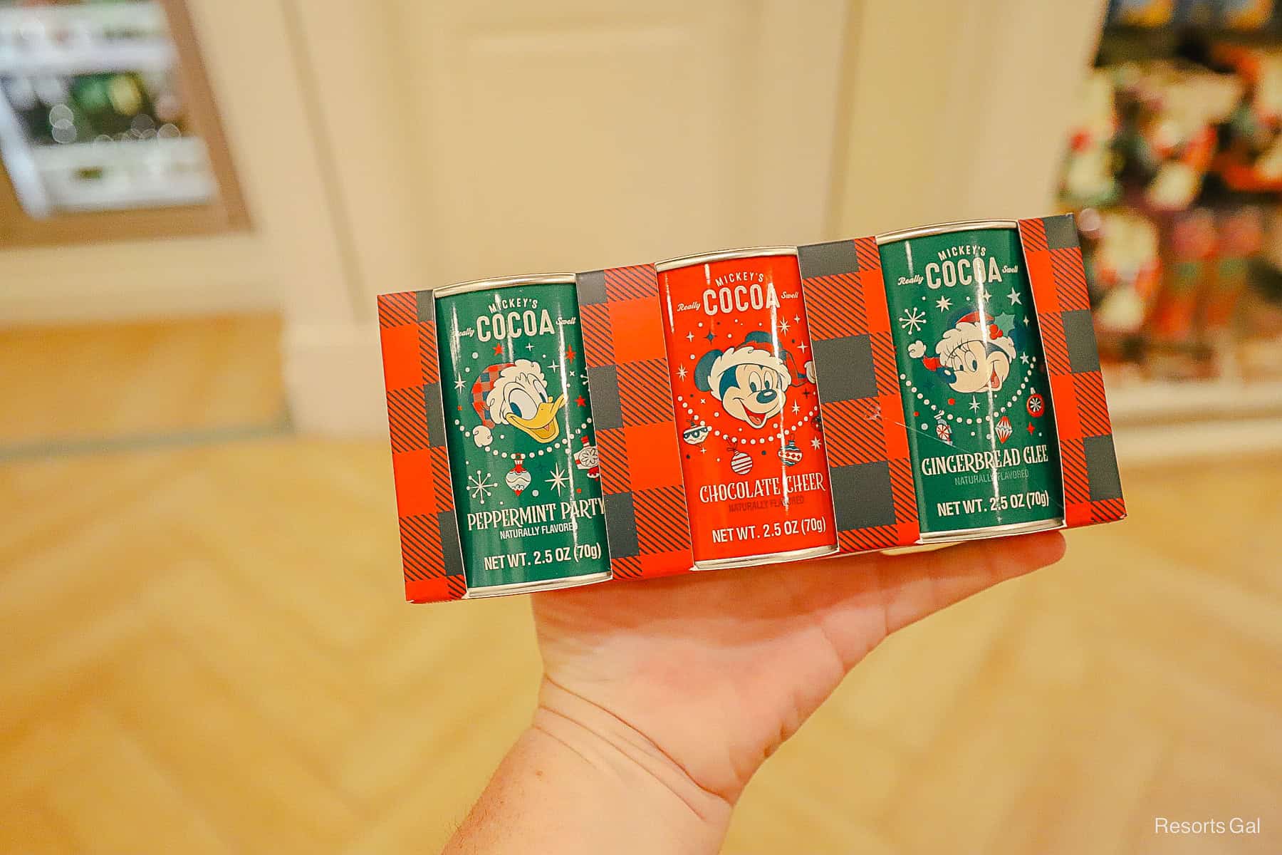 a trio of holiday hot cocoa featuring Donald, Mickey, and Minnie Mouse