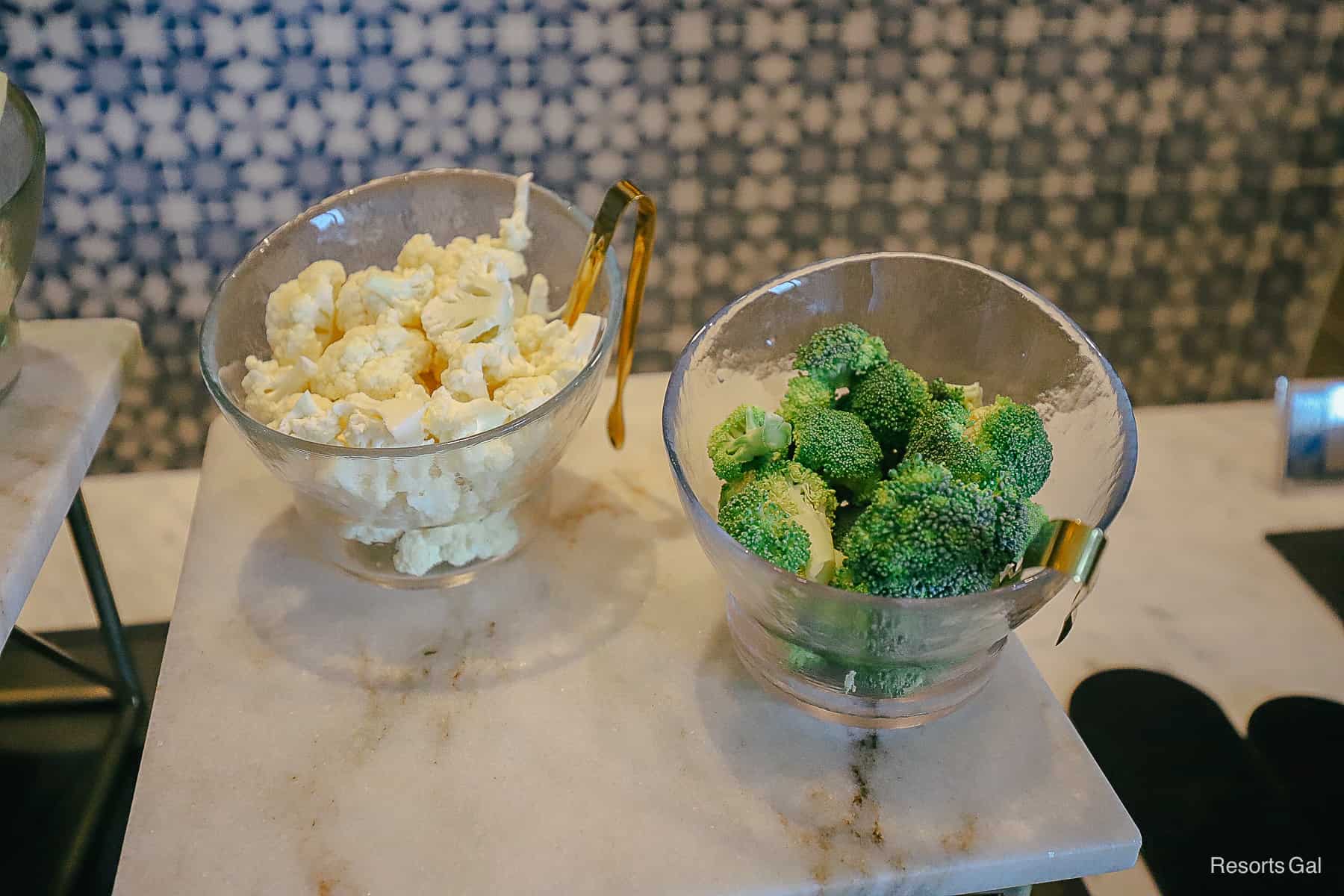 bowls of broccoli and cauliflower 