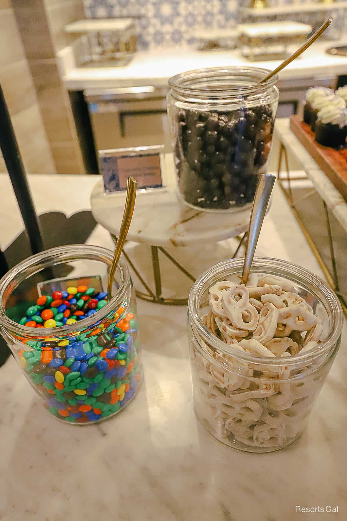 jars with Espresso beans, M&Ms, and yogurt covered pretzels 