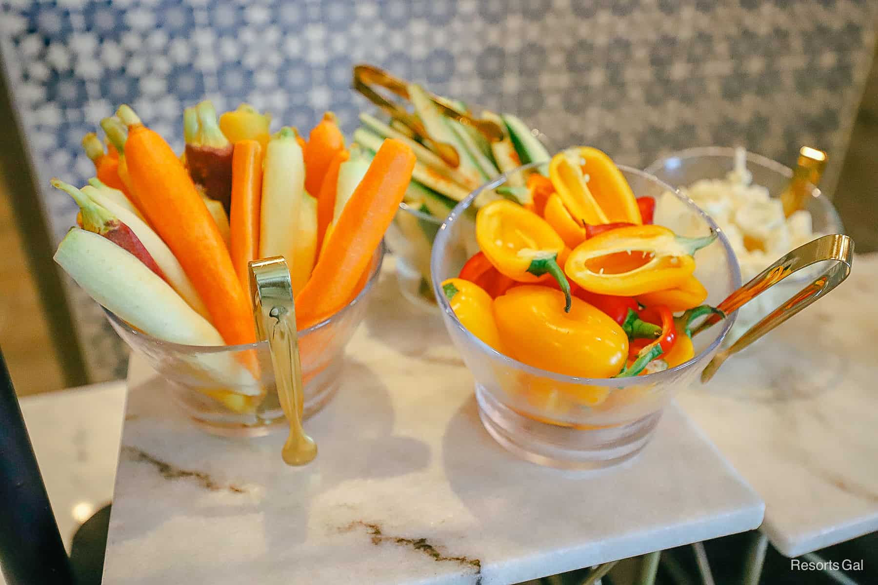 bowls with vegetables like carrots and peppers