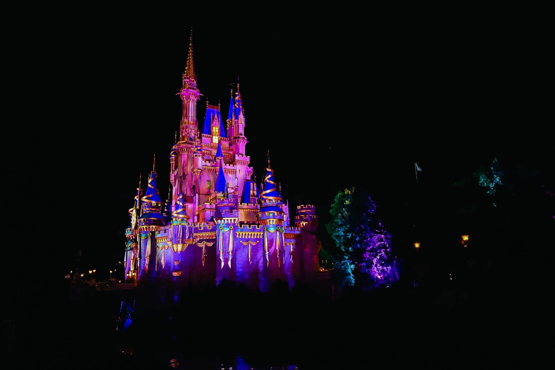Cinderella Castle lit up during Disney After Hours at Magic Kingdom. 