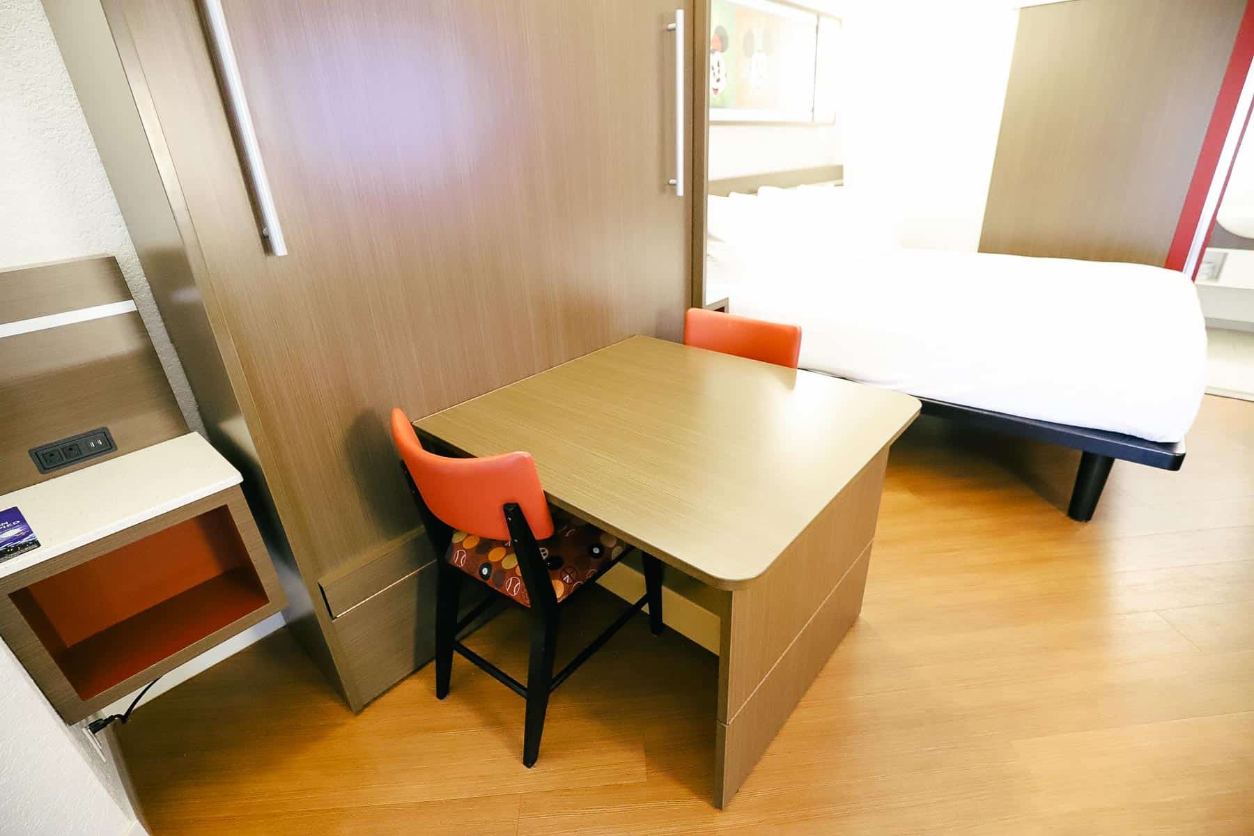 This table and chairs collapses to reveal a queen size bed.