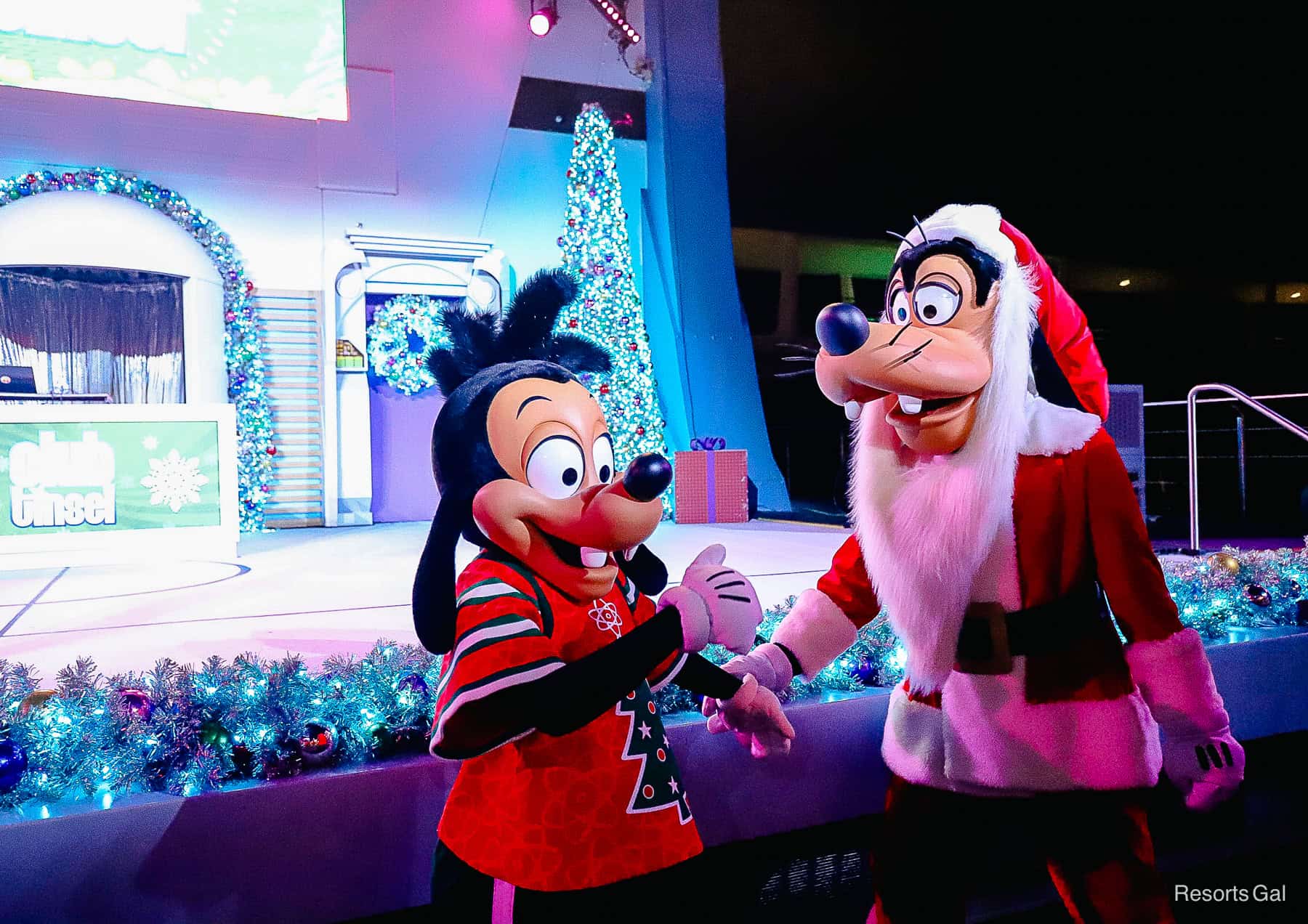 Santa Goofy dancing with Max Goof